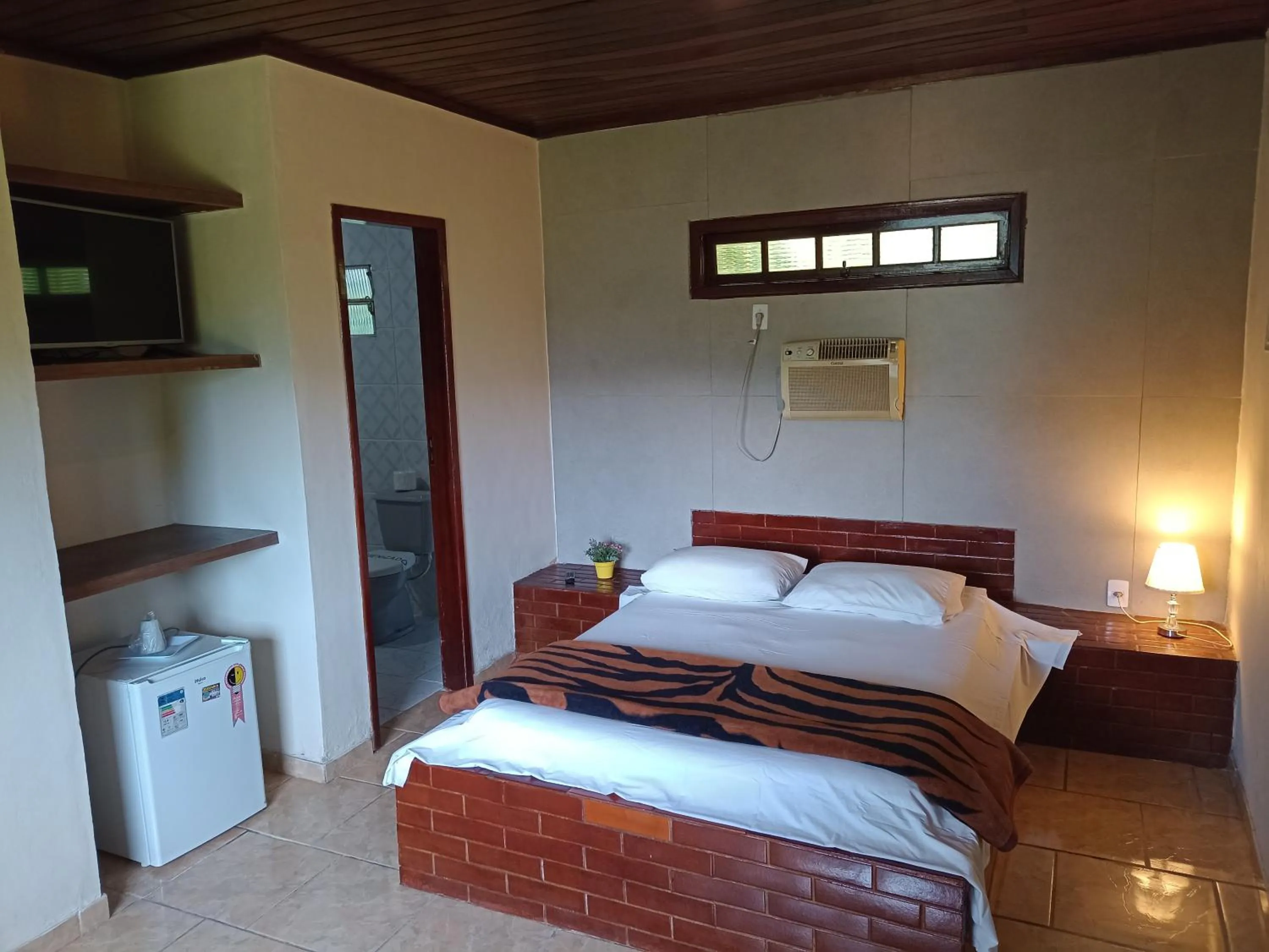 Bed in Pousada Chale da Montanha