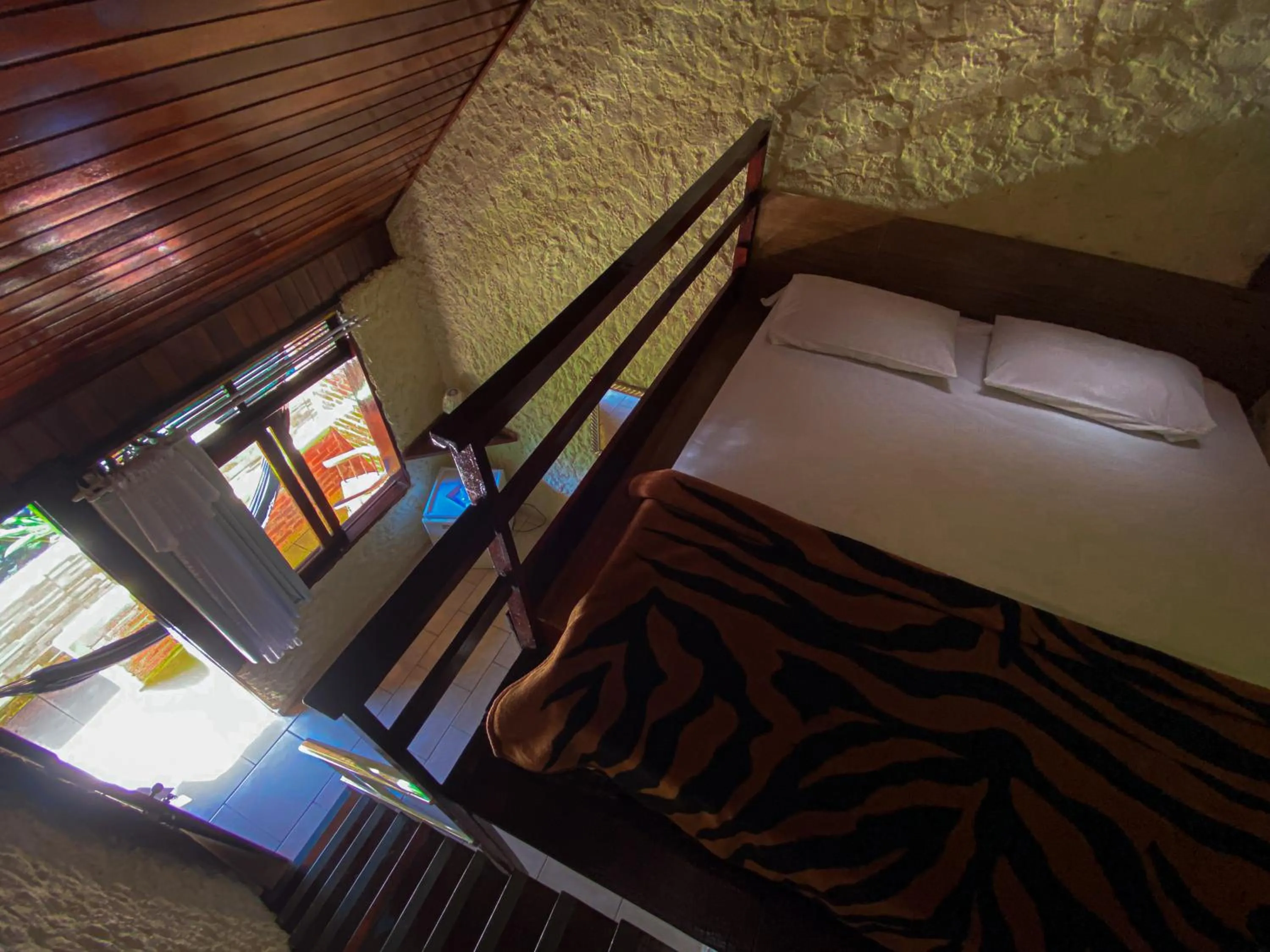 Bed in Pousada Chale da Montanha