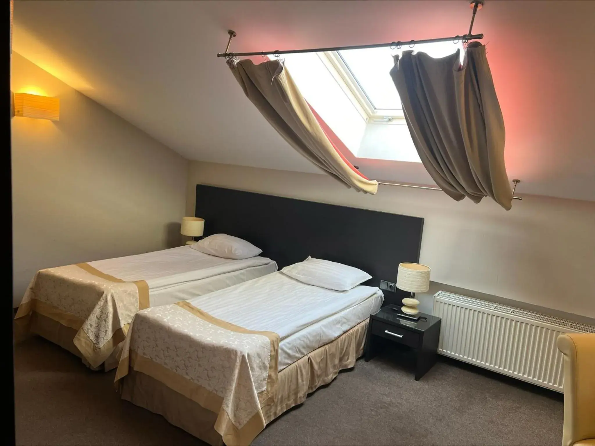 Budget Double or Twin Attic Room - single occupancy in Optima Collection Troitska Budget Double or Twin Attic Room - single occupancy in Optima Collection Troitska