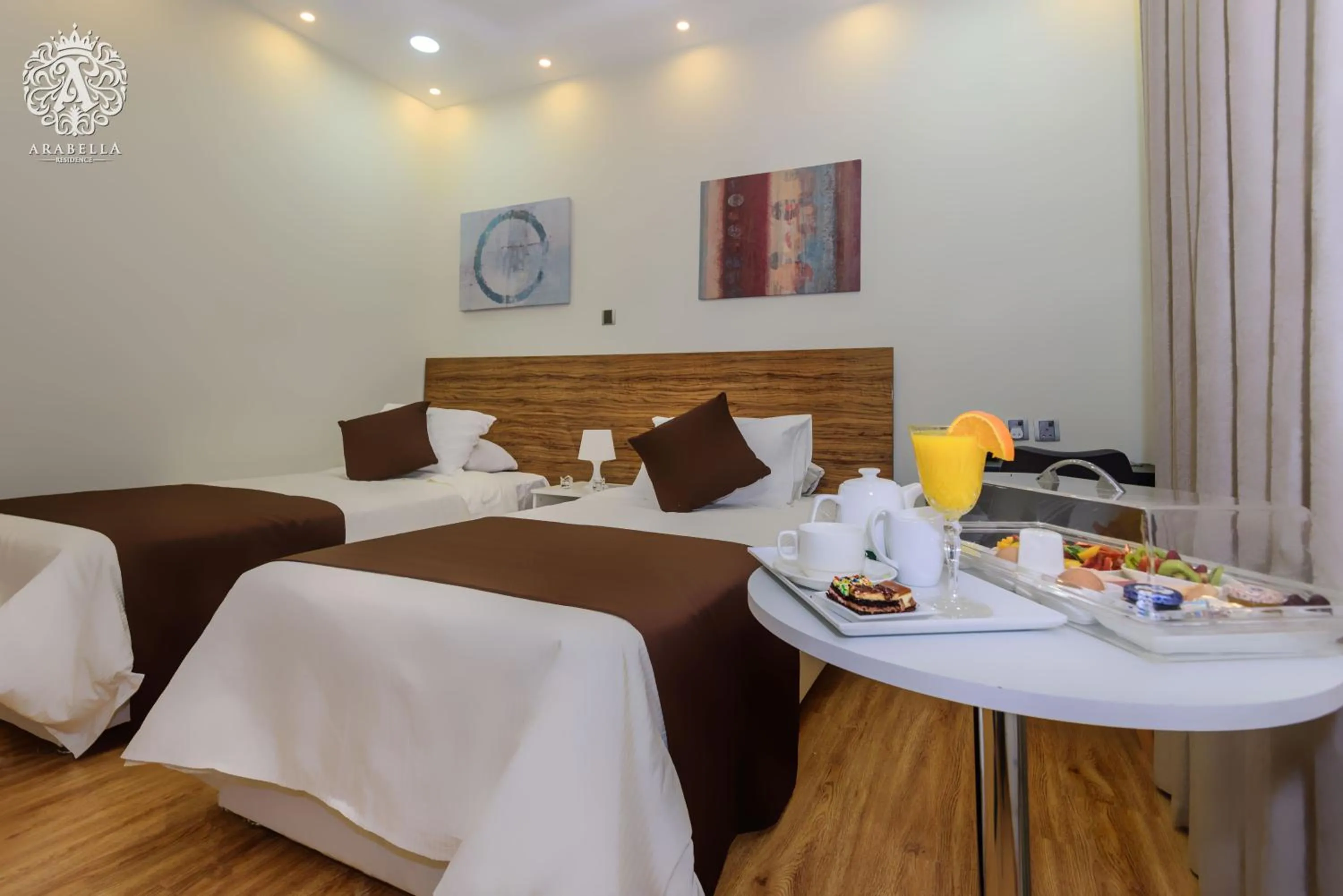 Seating area, Bed in Arabella Residence