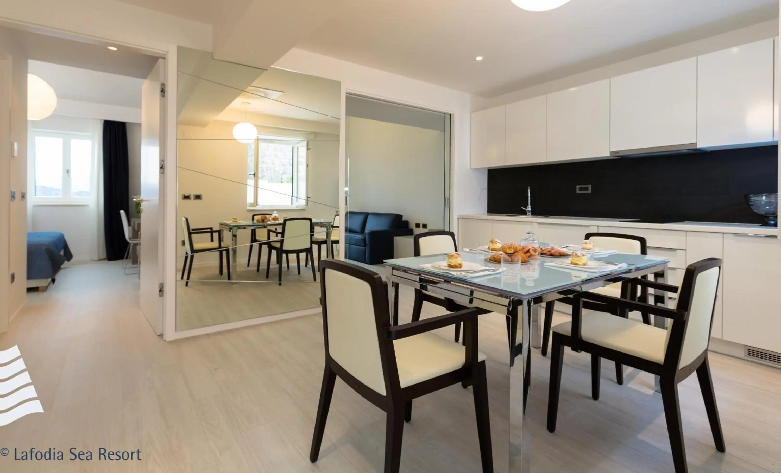 Kitchen or kitchenette, Dining Area in Lafodia Sea Resort