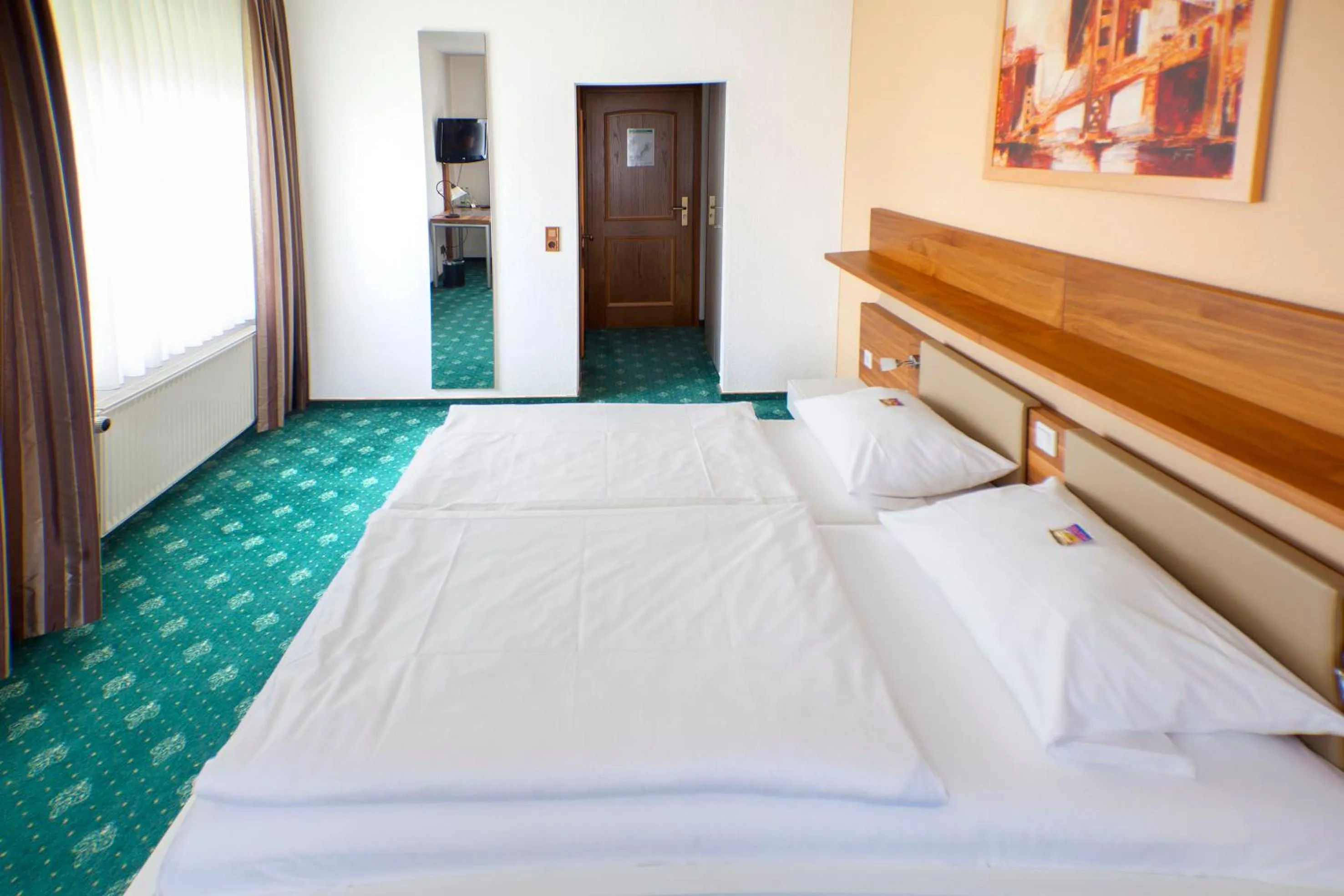 Photo of the whole room, Bed in Hotel & Restaurant Ernst