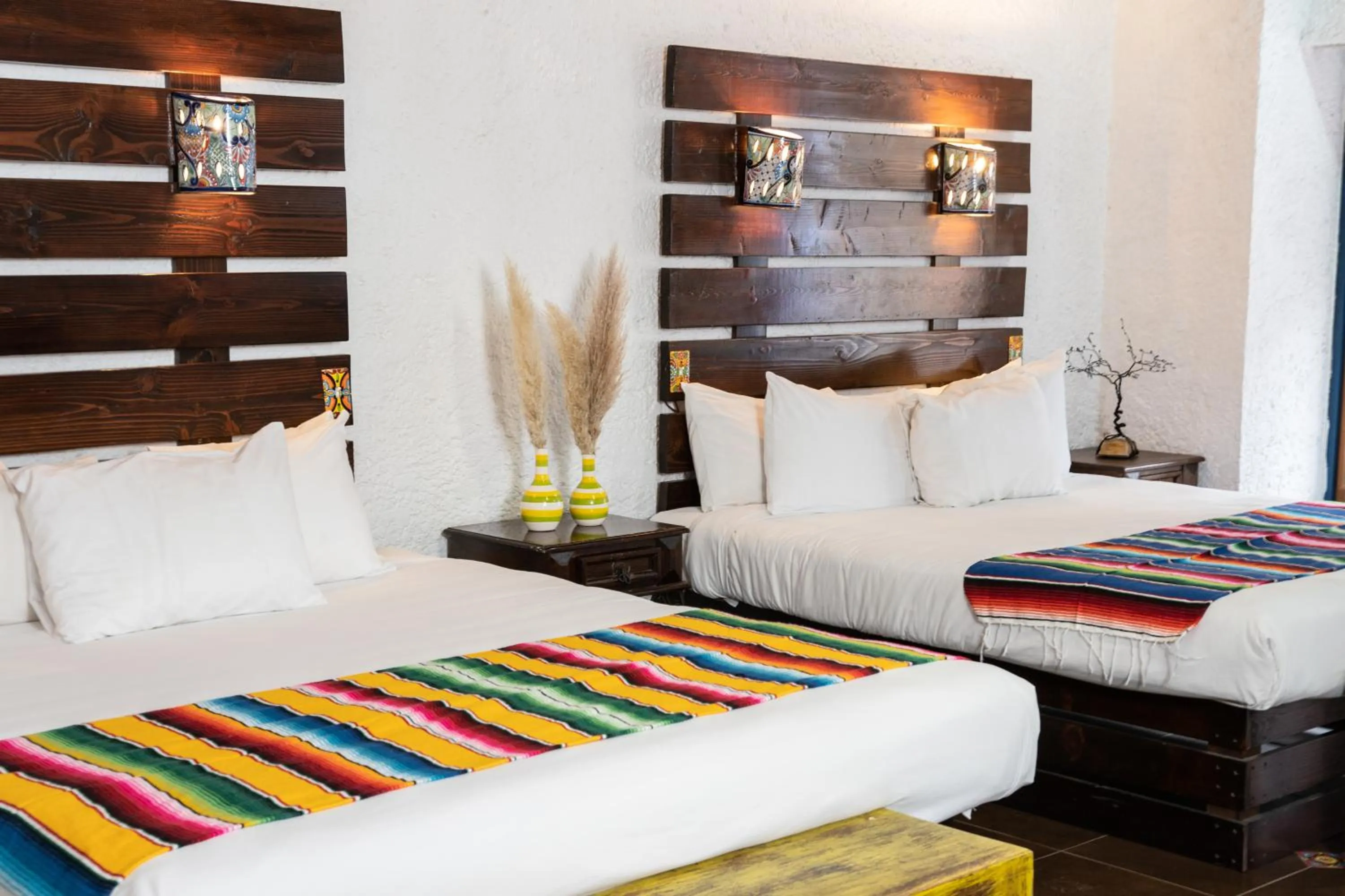 Bed in Las Rocas Resort & Spa