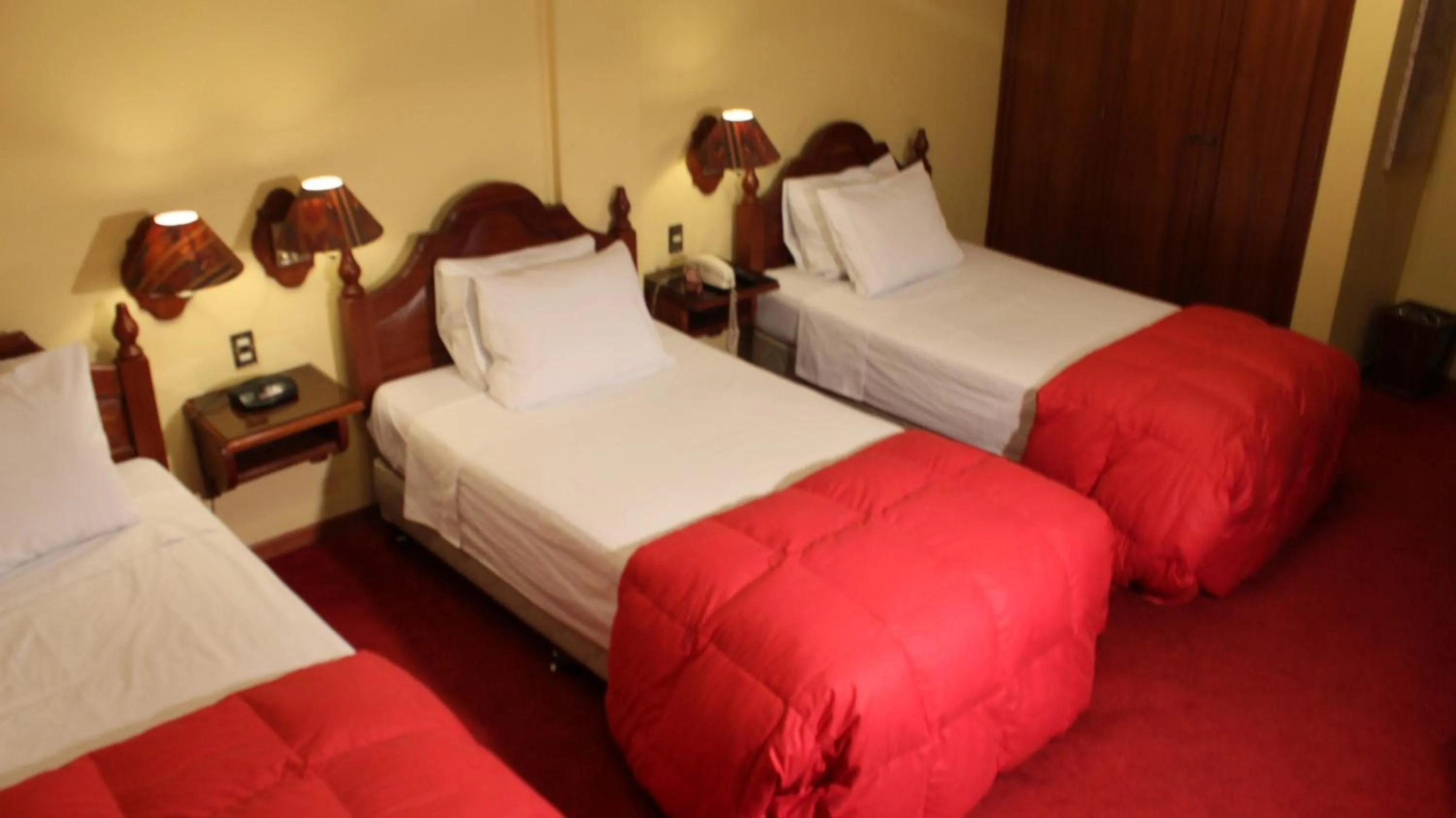 Bed in Hotel Casona Colon Inn