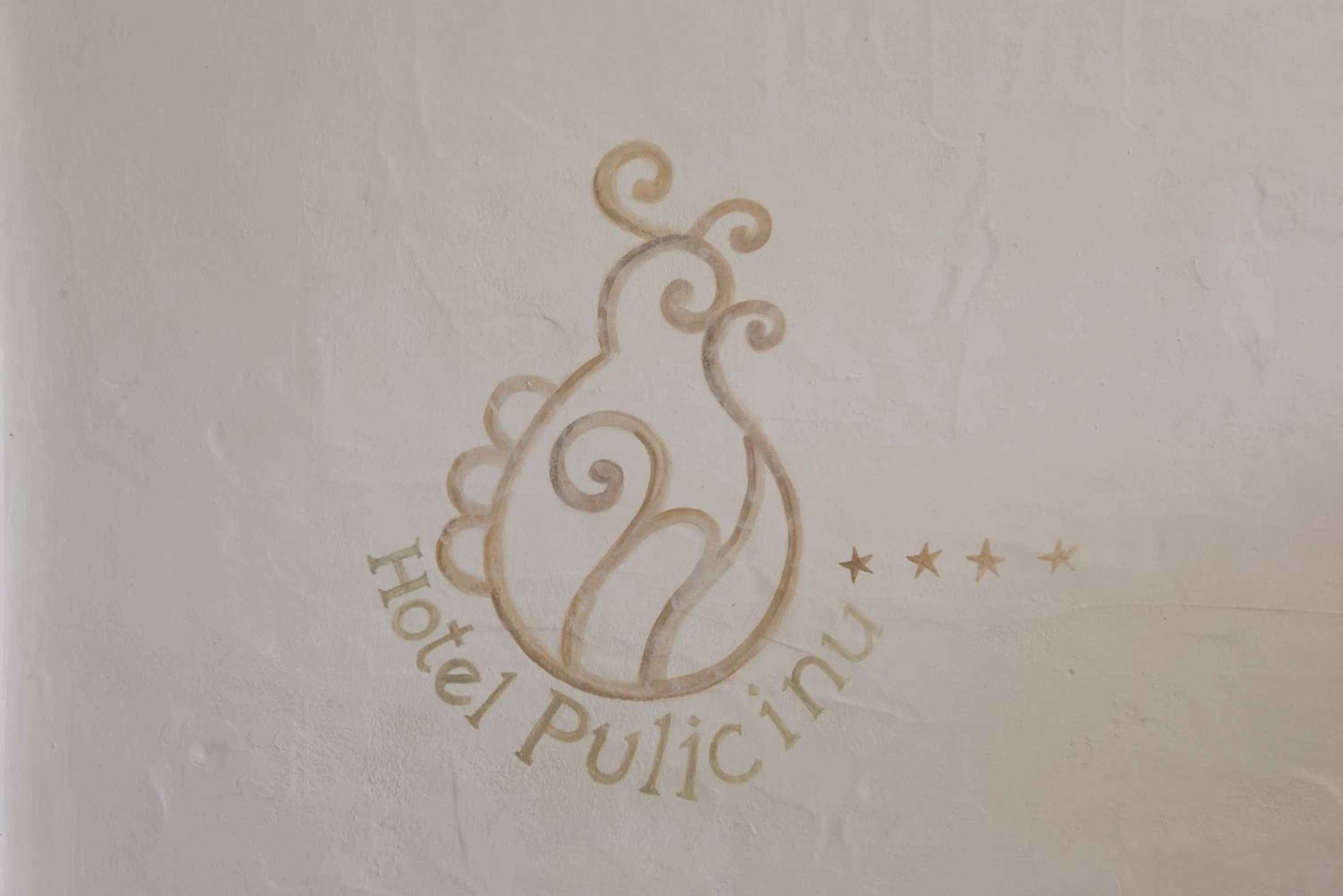 Property logo or sign in Hotel Pulicinu