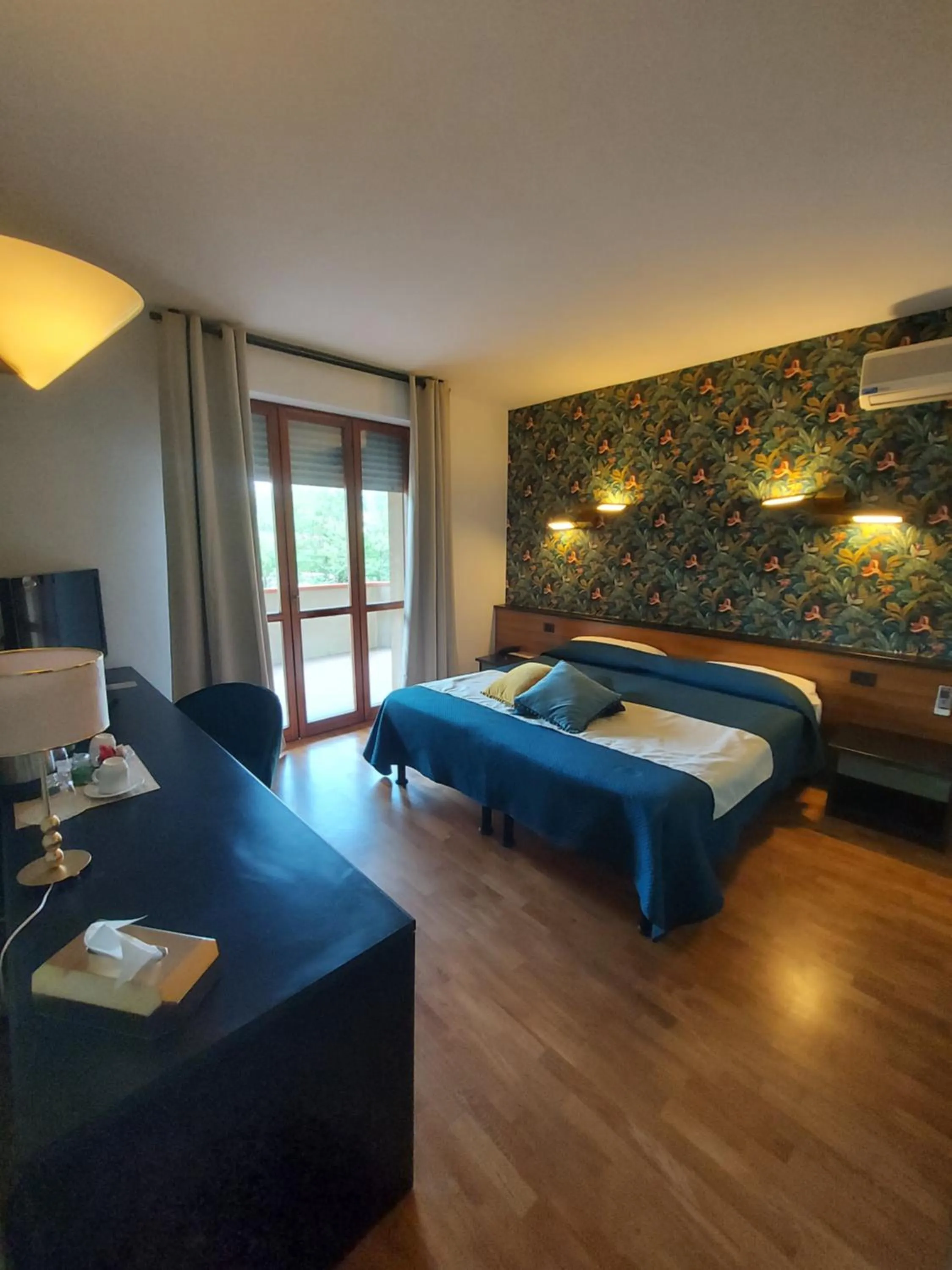 Photo of the whole room, Bed in EcoHotel Ristorante Milano