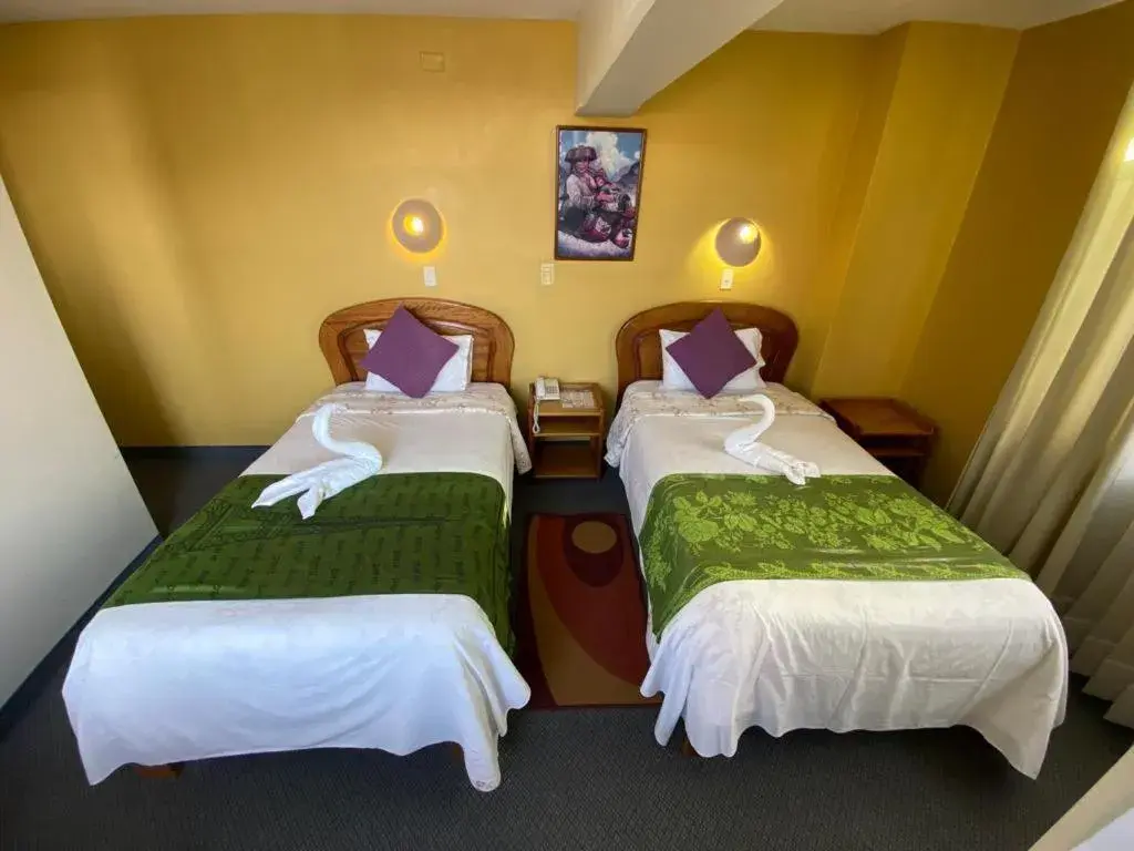 Twin Room in Hostal Oscar Inn Twin Room in Hostal Oscar Inn