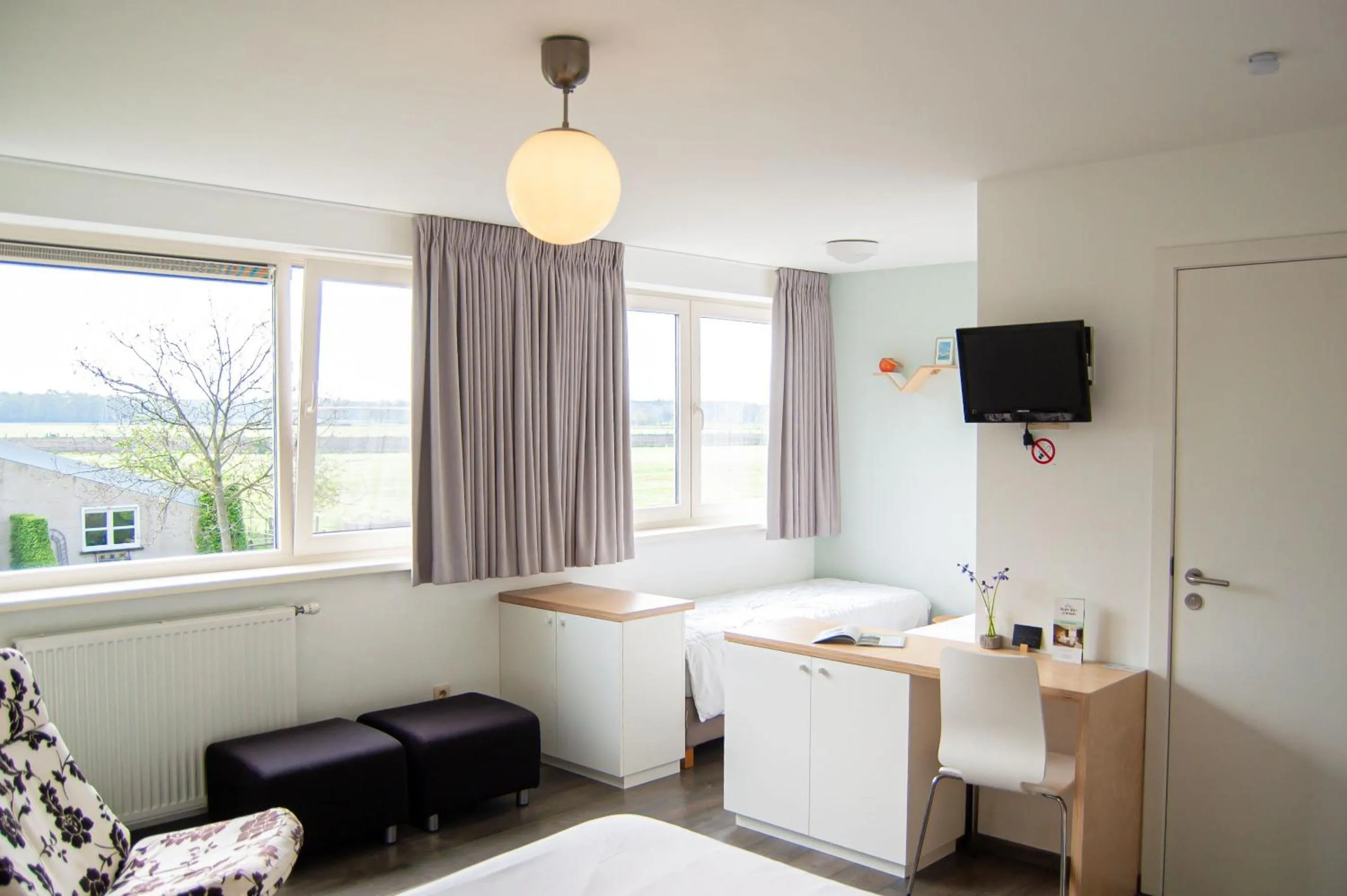 Bed in B&B Tuin der Zinnen