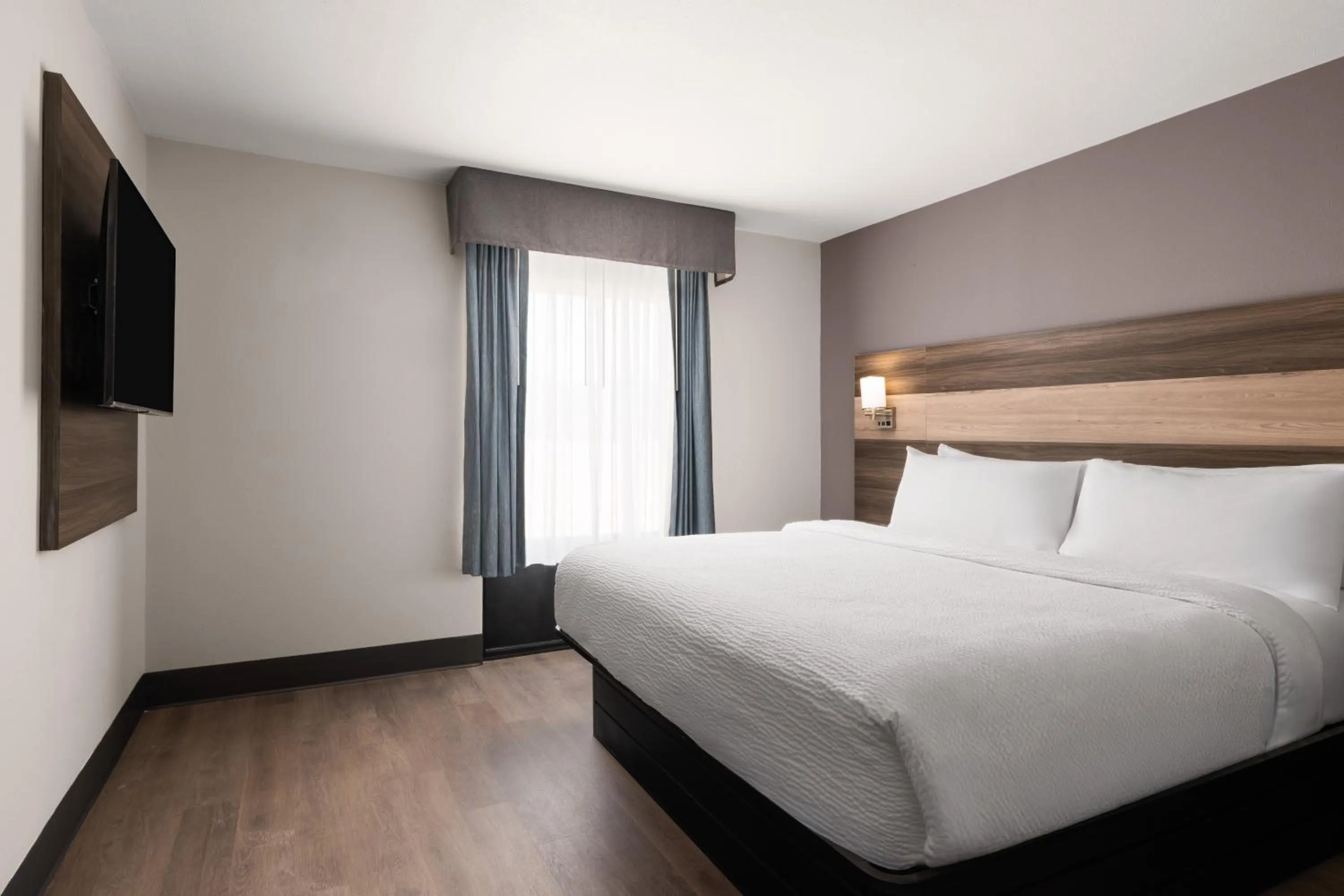 Bed in Garner Hotel Augusta West by IHG