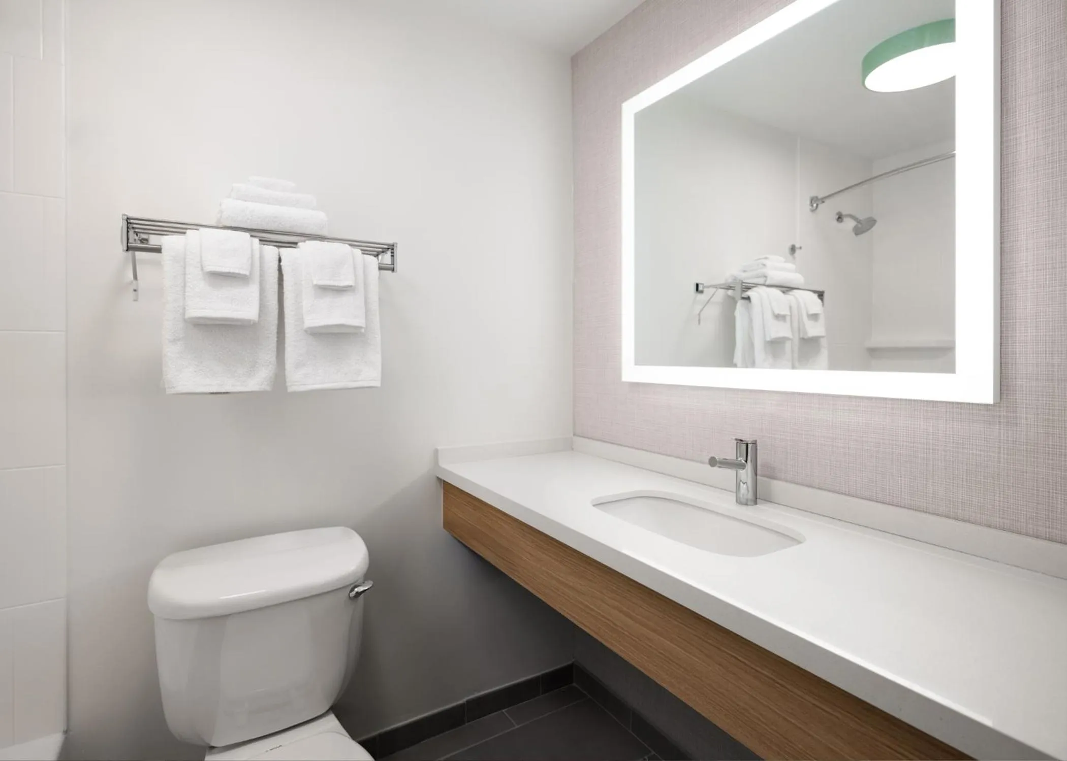 Bathroom in Garner Hotel Augusta West by IHG