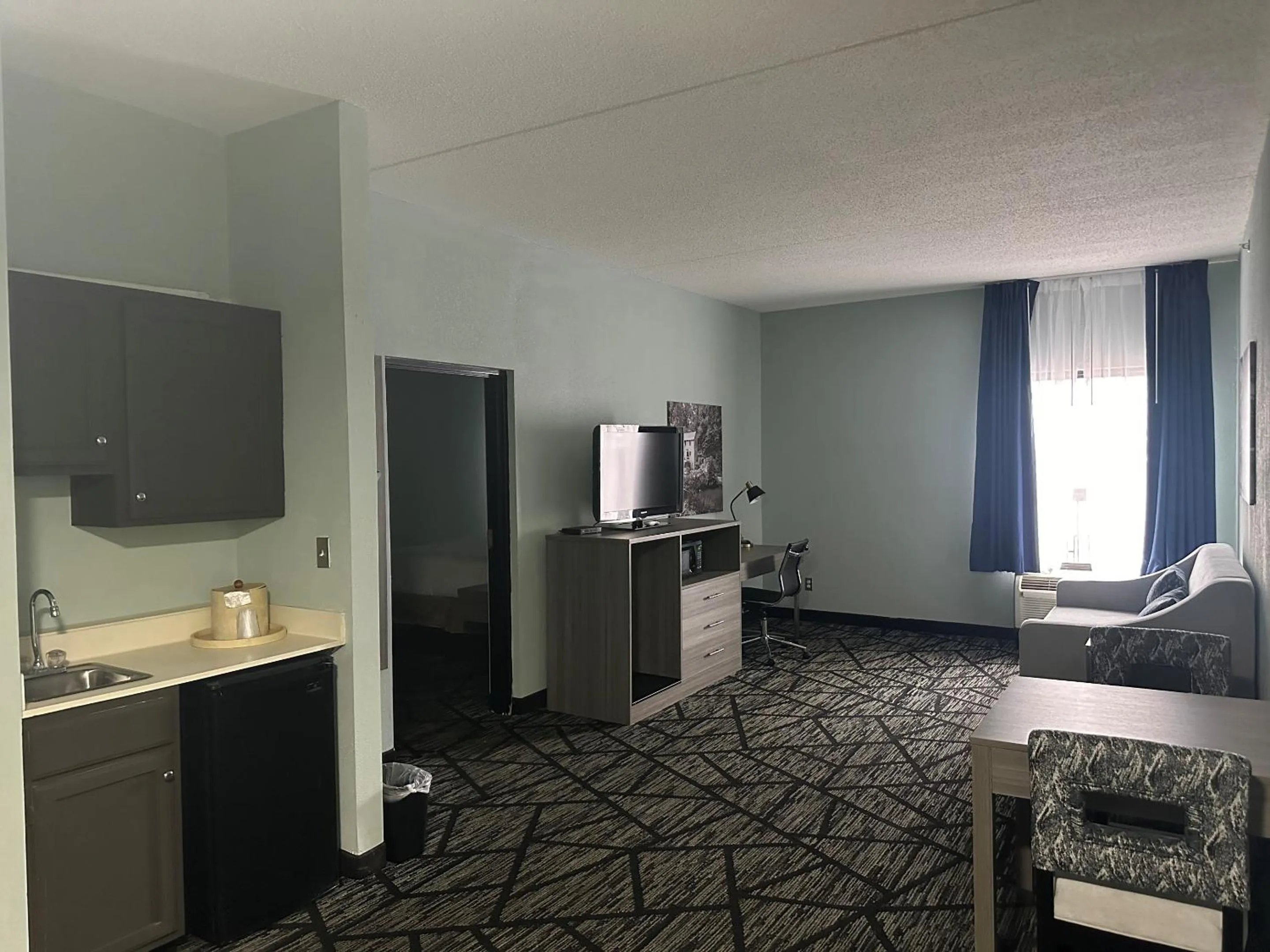 Living room in Wingate by Wyndham North Little Rock