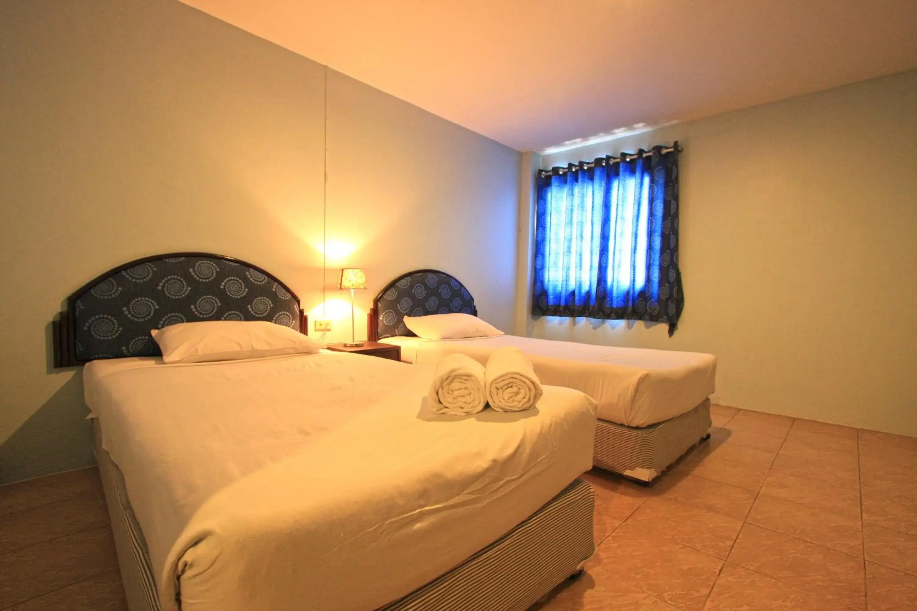 Bed in Chaba Chalet Hotel Bed in Chaba Chalet Hotel