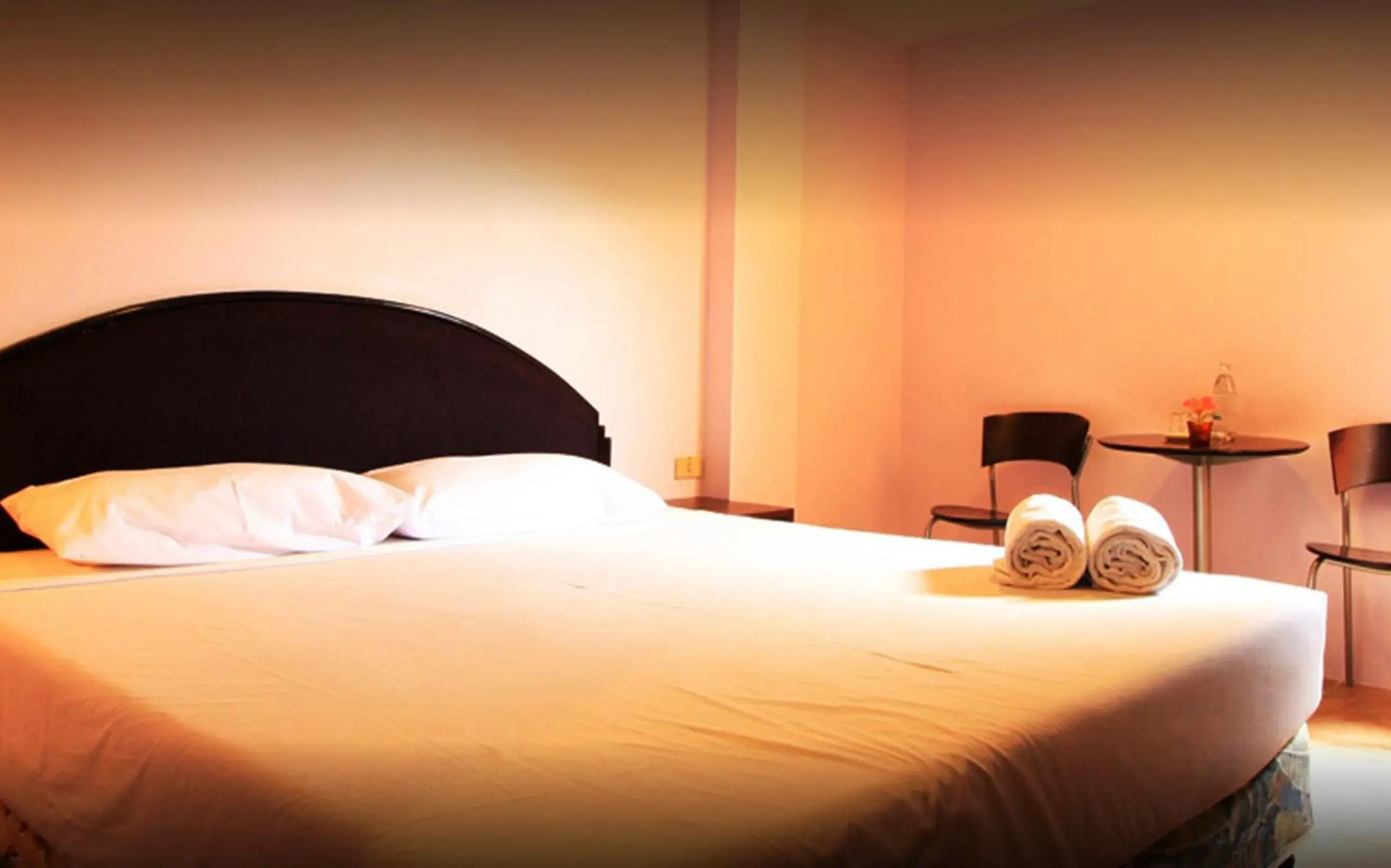 Bed in Chaba Chalet Hotel Bed in Chaba Chalet Hotel