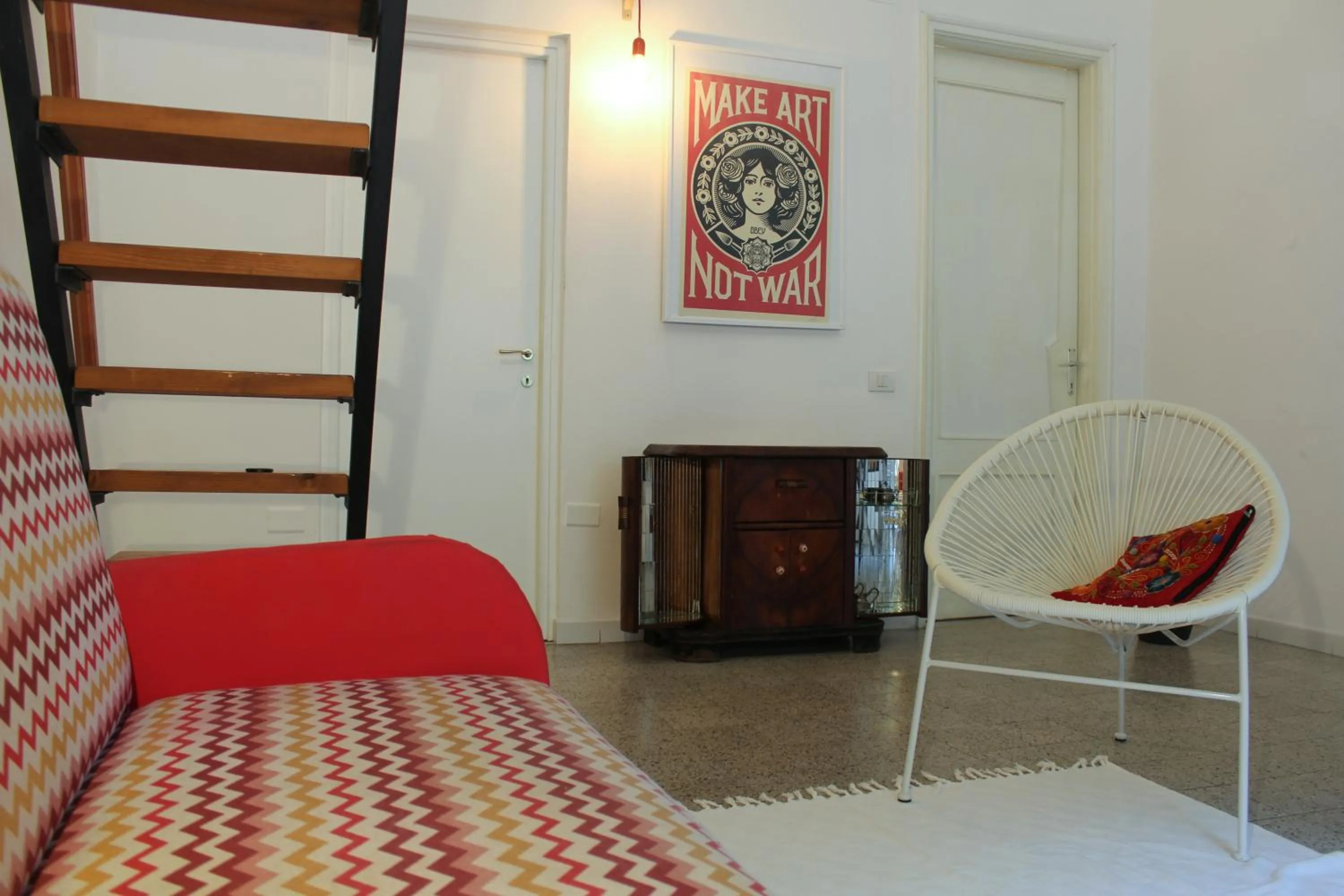 Living room, Bed in Sa Prazza GuestHouse