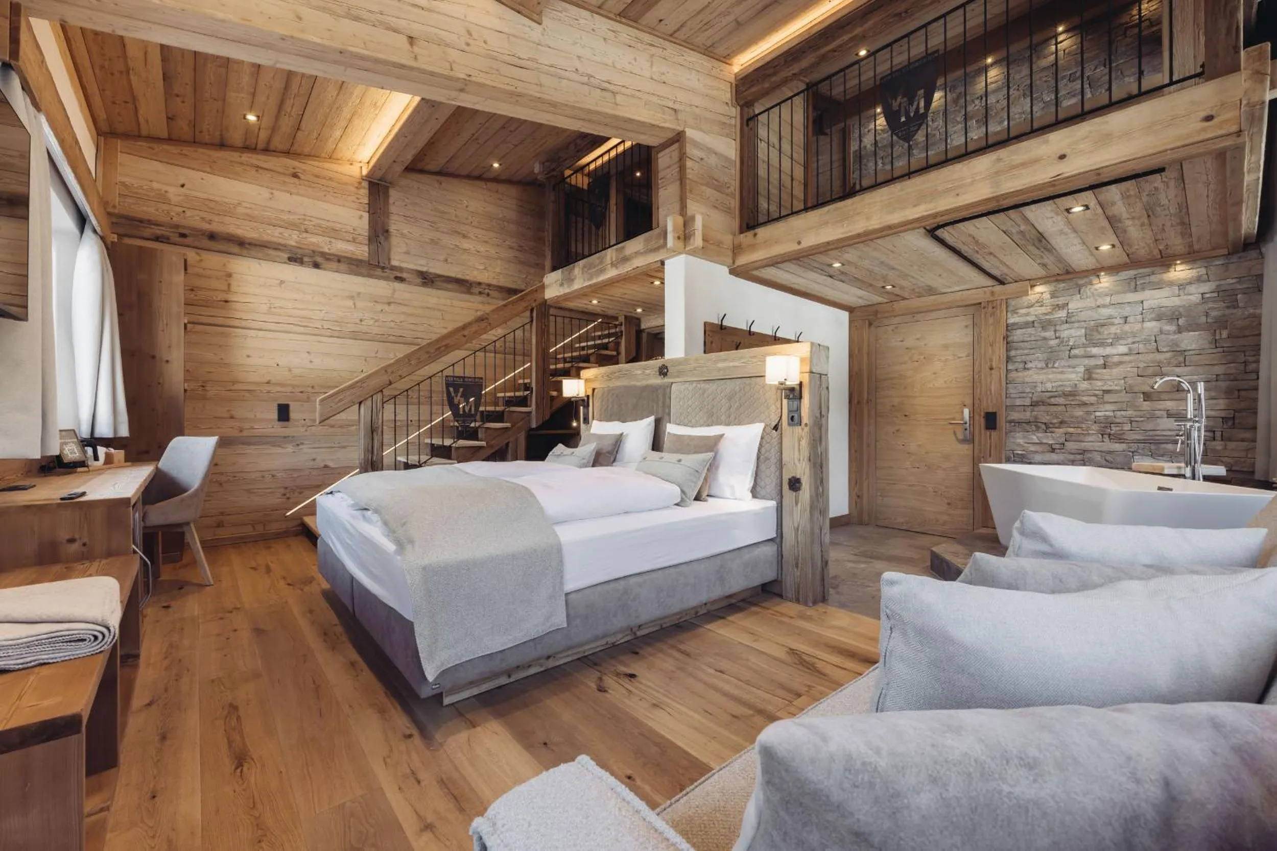 Bathroom, Bed in Genusshotel Vermala Montafon