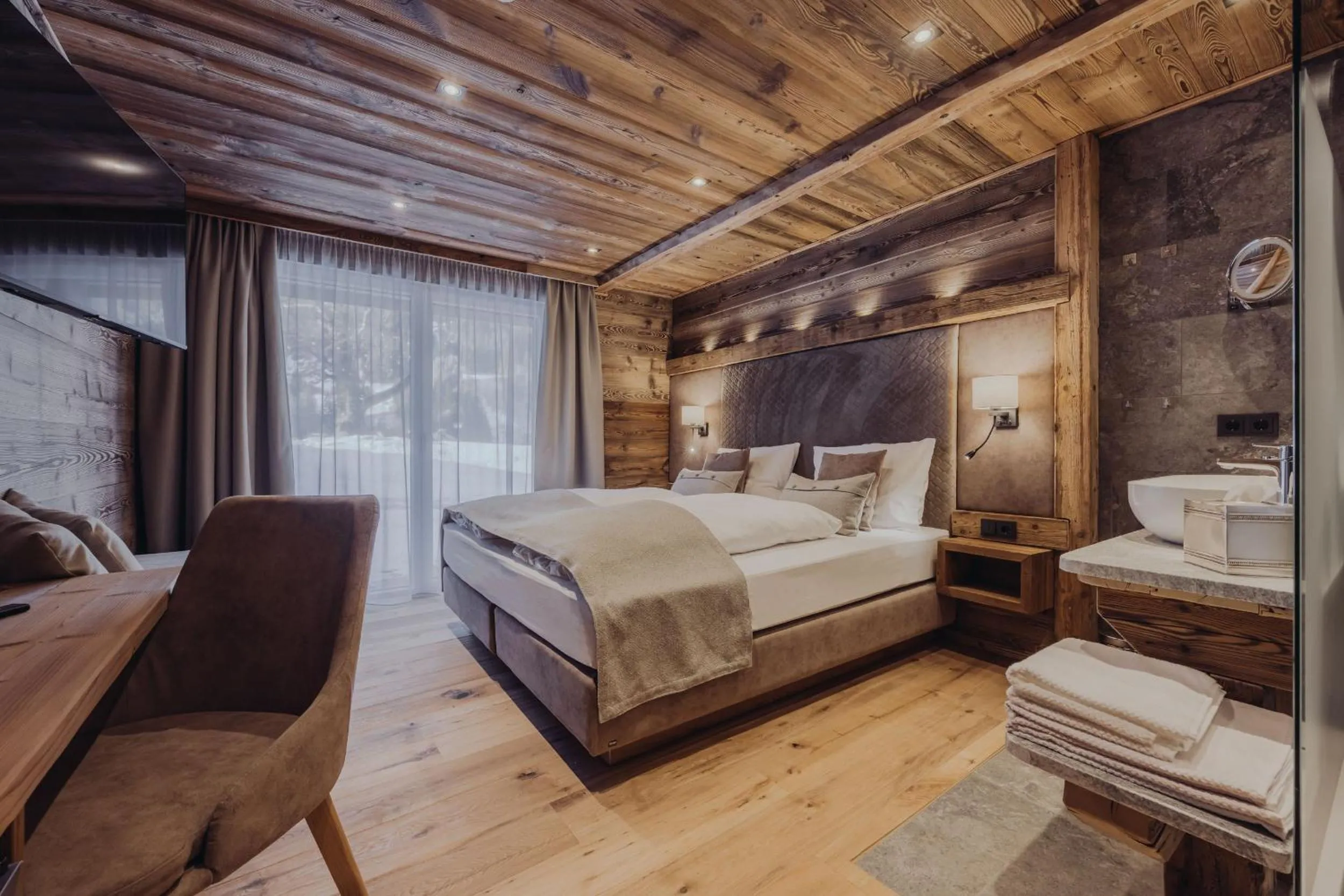 Photo of the whole room, Bed in Genusshotel Vermala Montafon