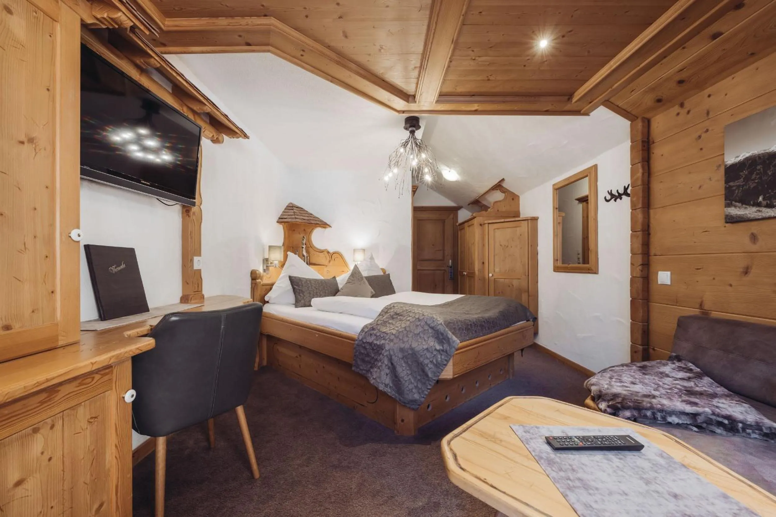 Photo of the whole room, Bed in Genusshotel Vermala Montafon