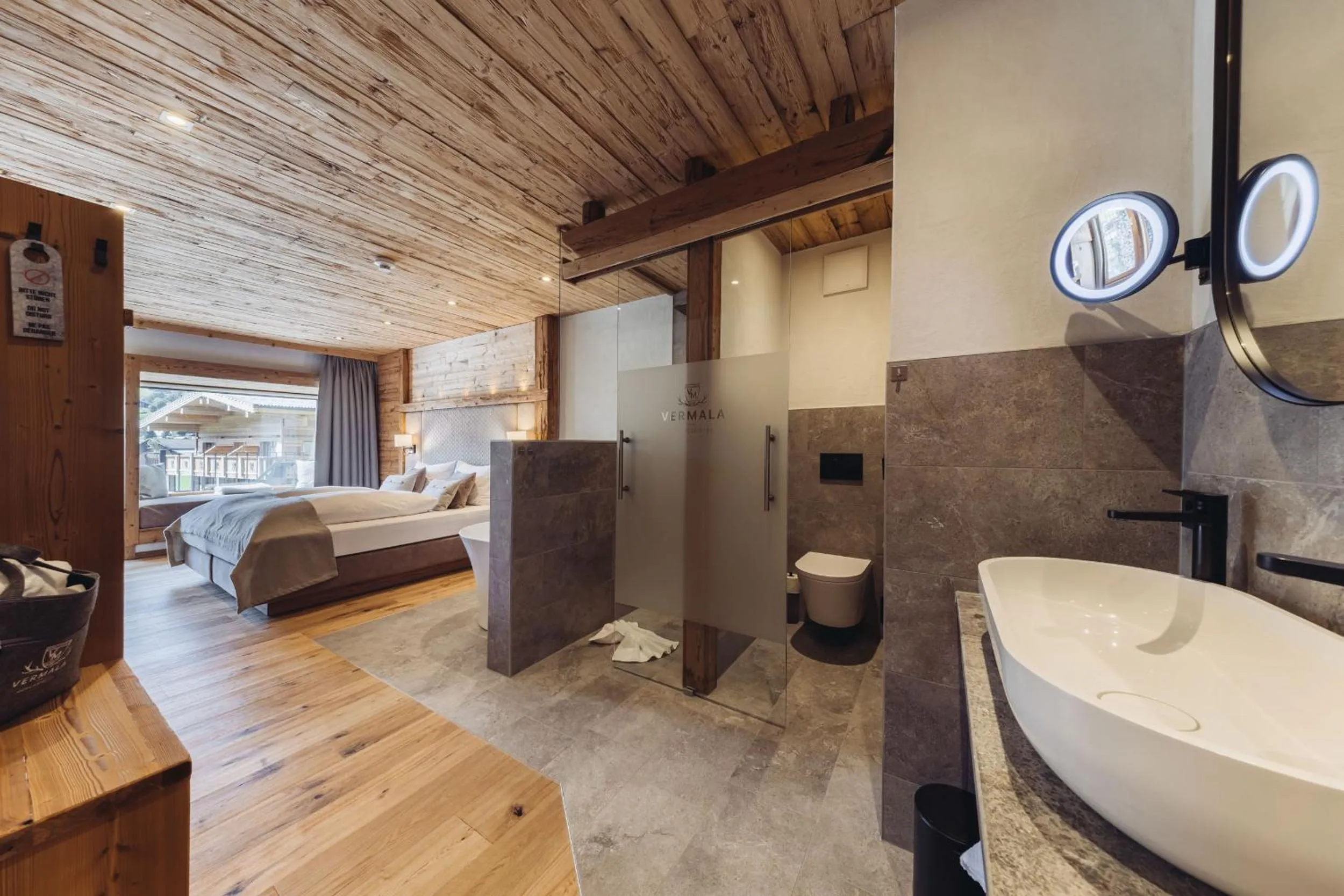 Photo of the whole room, Bed in Genusshotel Vermala Montafon