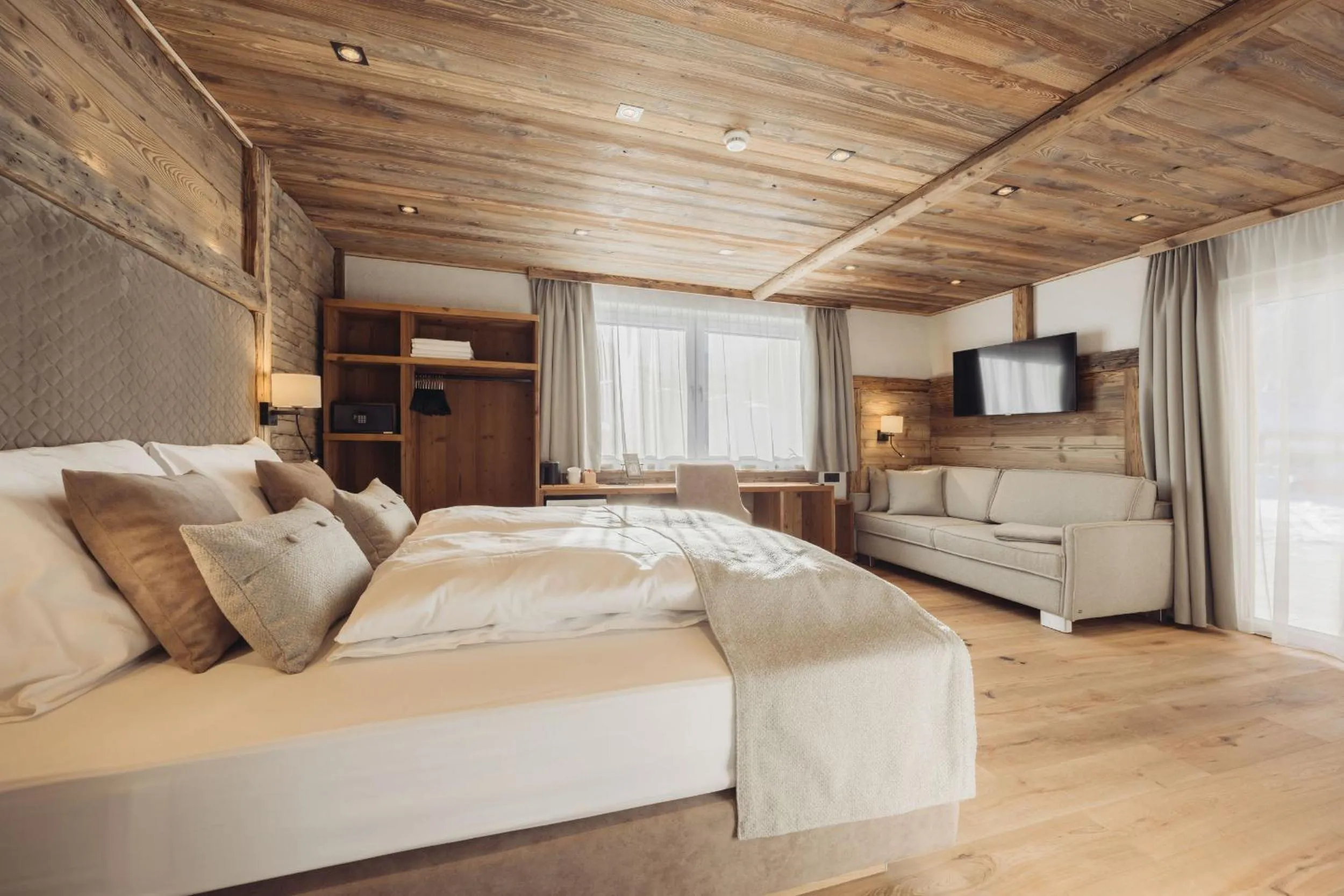 Photo of the whole room, Bed in Genusshotel Vermala Montafon
