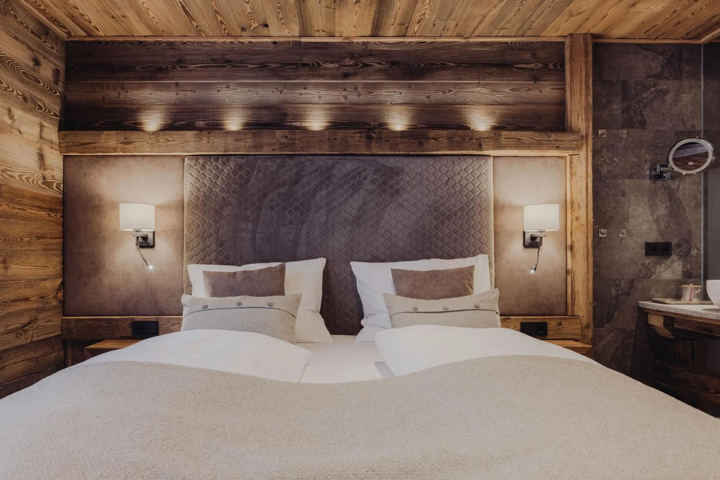 Photo of the whole room, Bed in Genusshotel Vermala Montafon