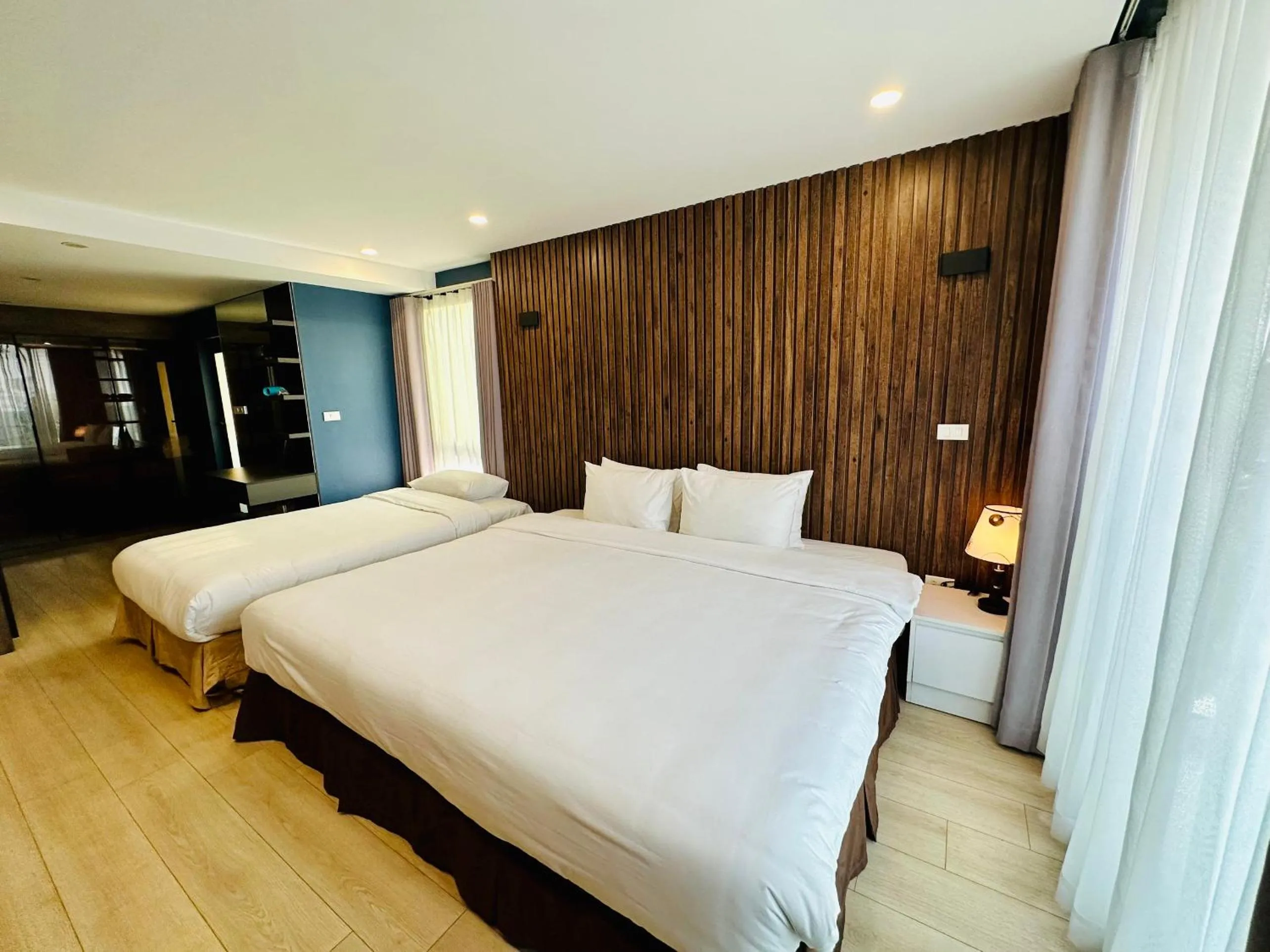Bed in Ficus Suites
