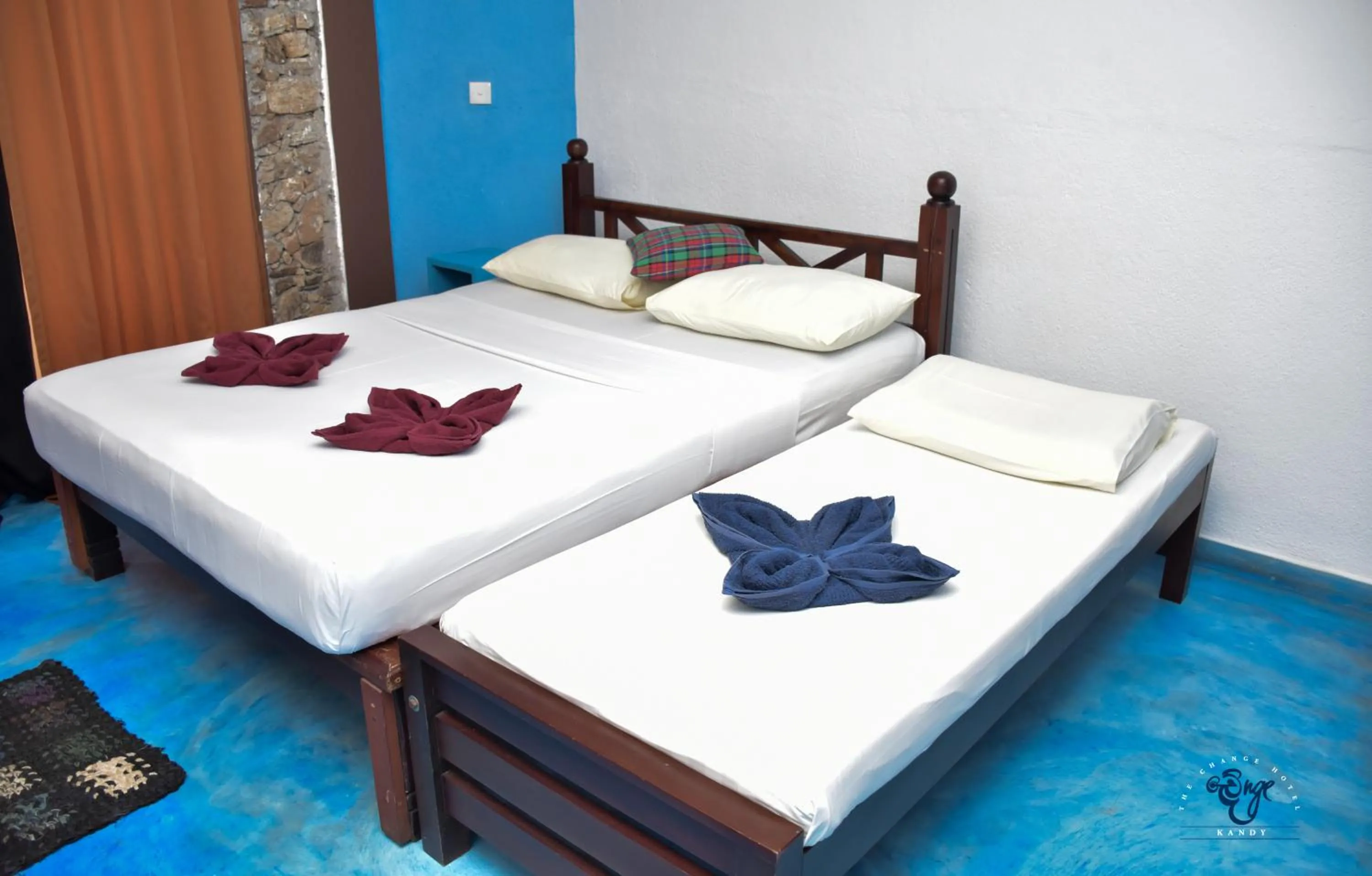 Bed in The Change Hotel