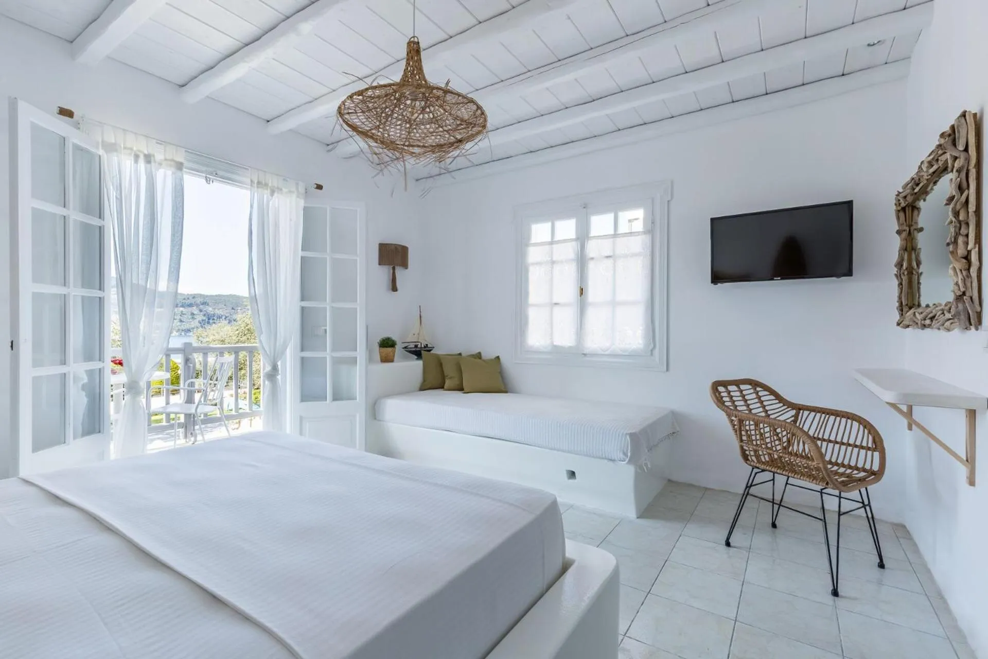 Bed in Evlalia Studios & Villas