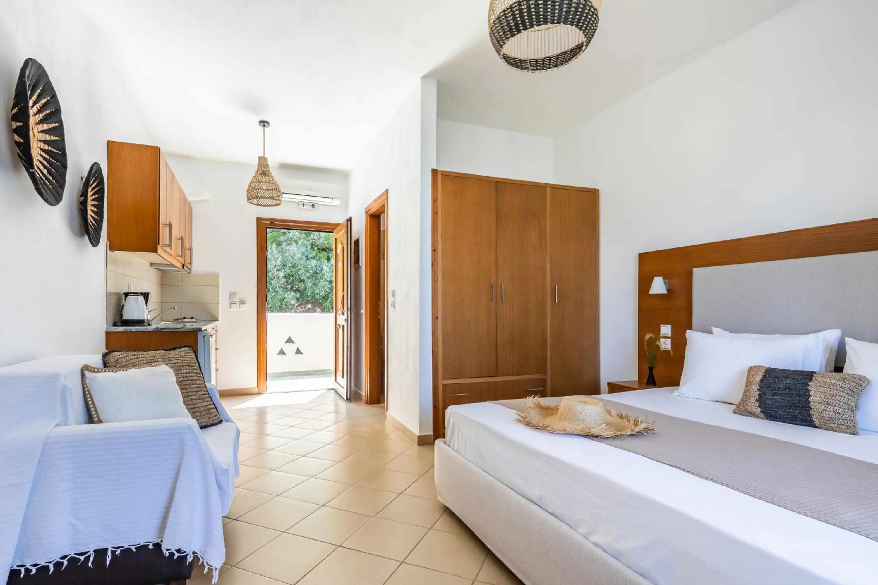 Bed in Evlalia Studios & Villas