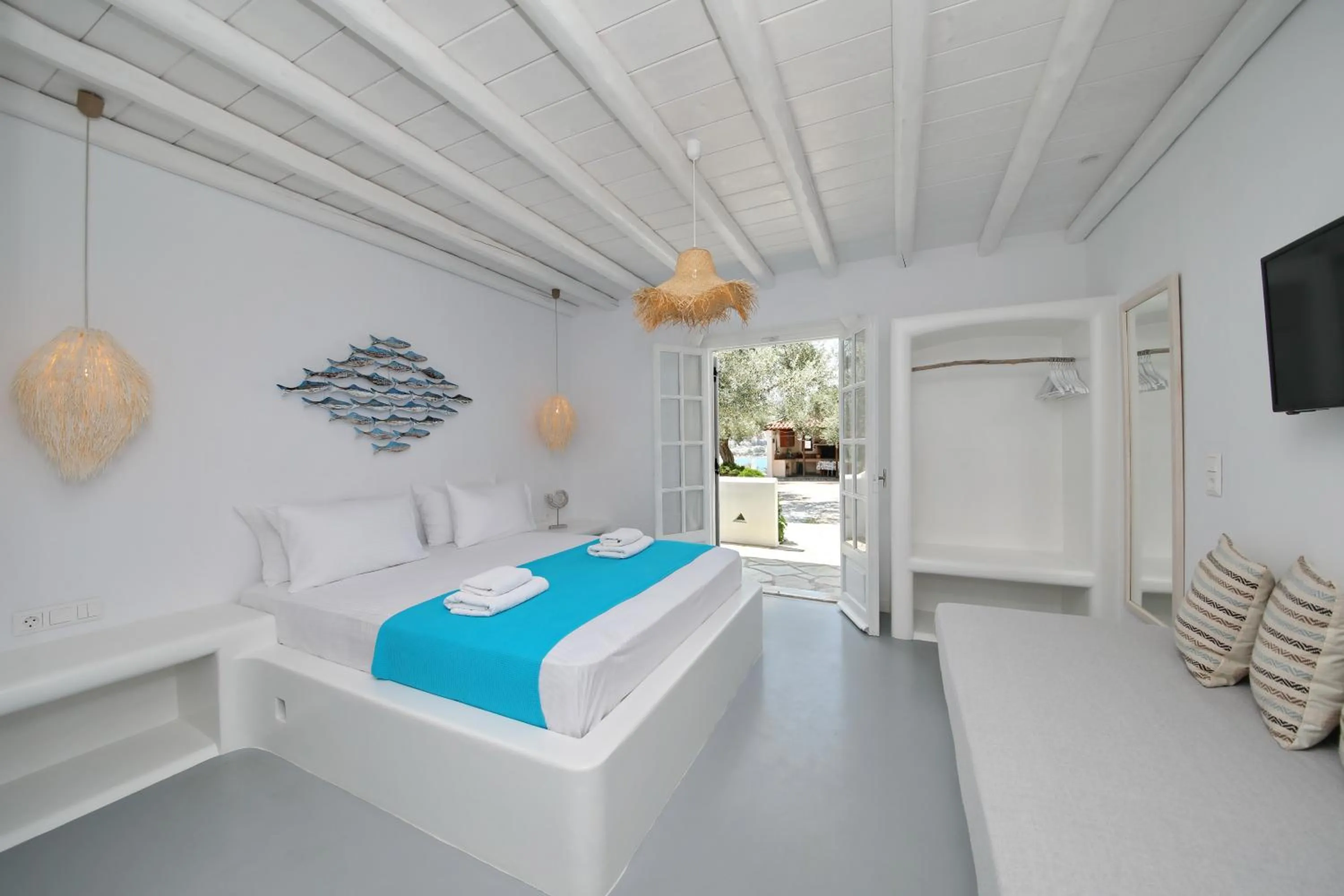 Bed in Evlalia Studios & Villas