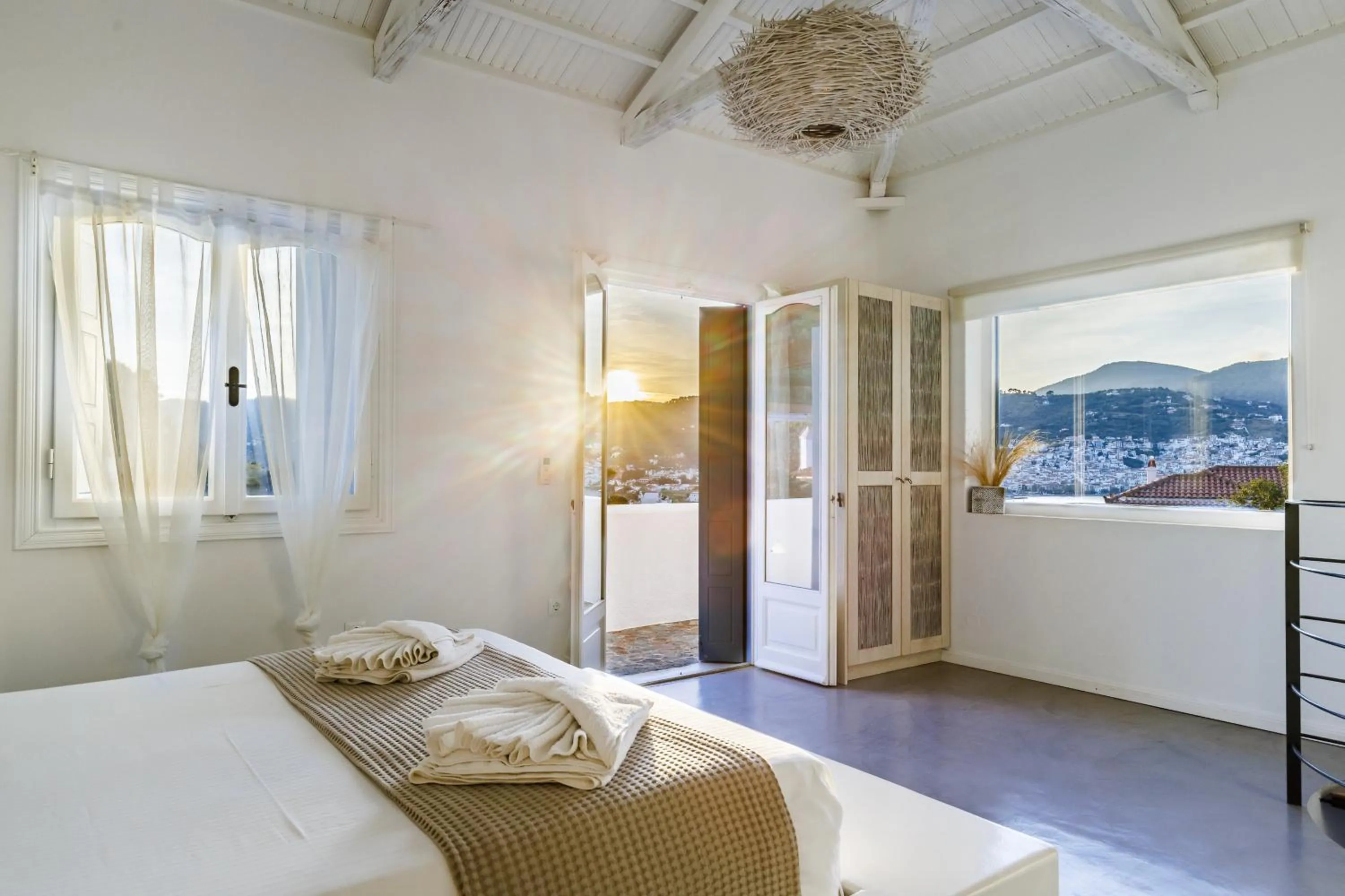 Bed in Evlalia Studios & Villas