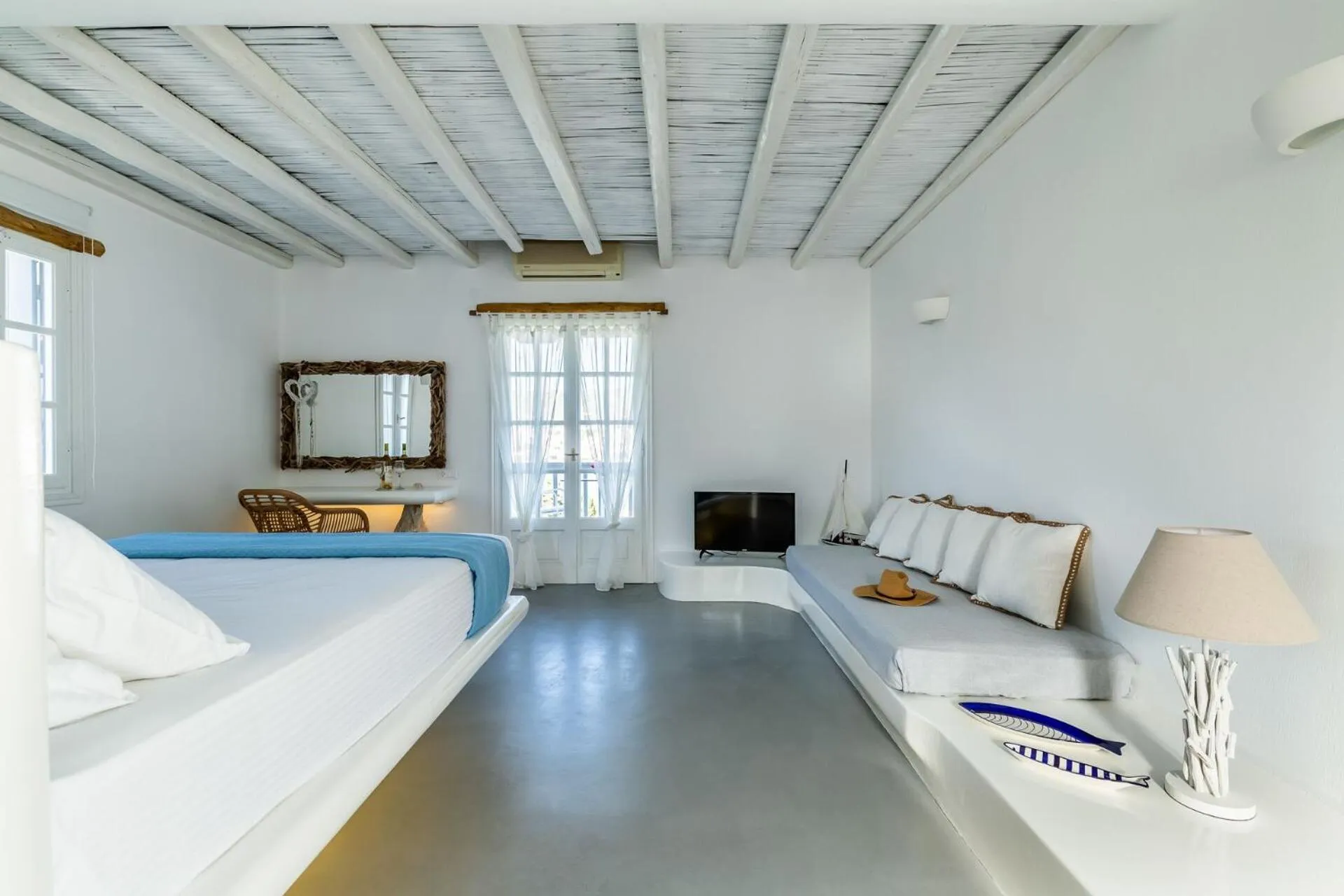 Bed in Evlalia Studios & Villas