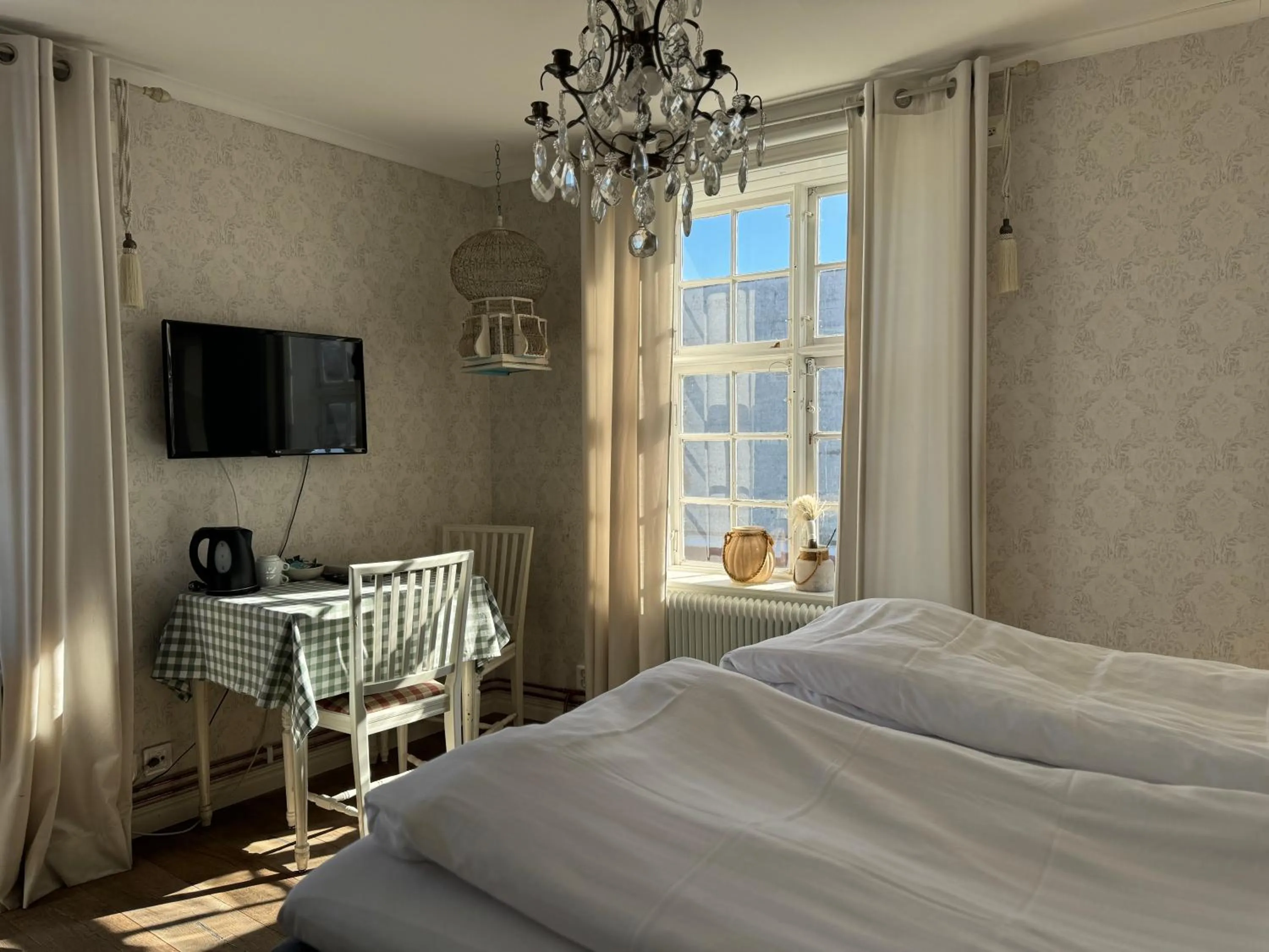 Photo of the whole room, Bed in Hotell Vaxblekaregården