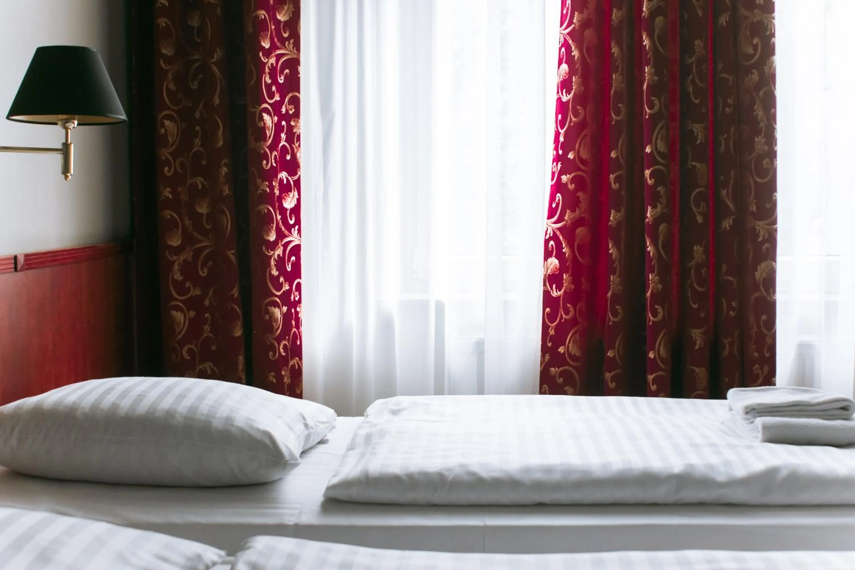 Bed in Merite Hotels Hamburg Altona GmbH