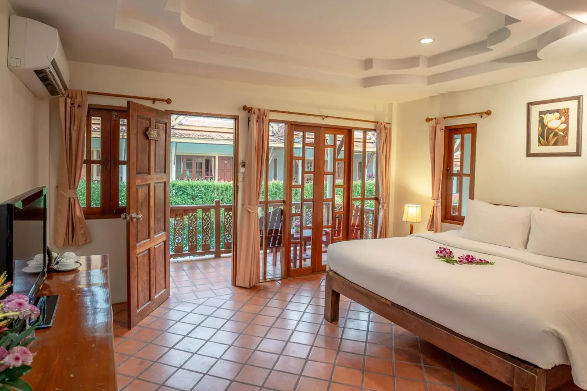 Balcony/Terrace, Bed in Bangtao Village Resort - SHA Balcony/Terrace, Bed in Bangtao Village Resort - SHA