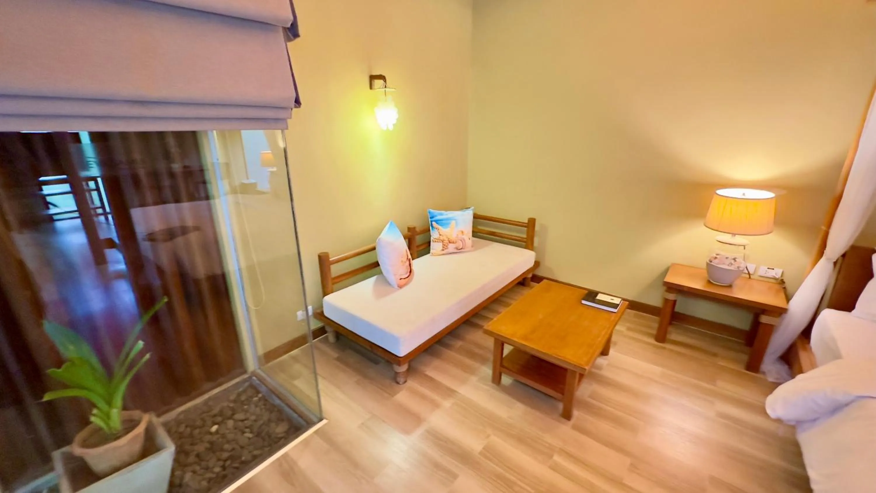 Seating area, Bed in Deva Beach Resort Samui