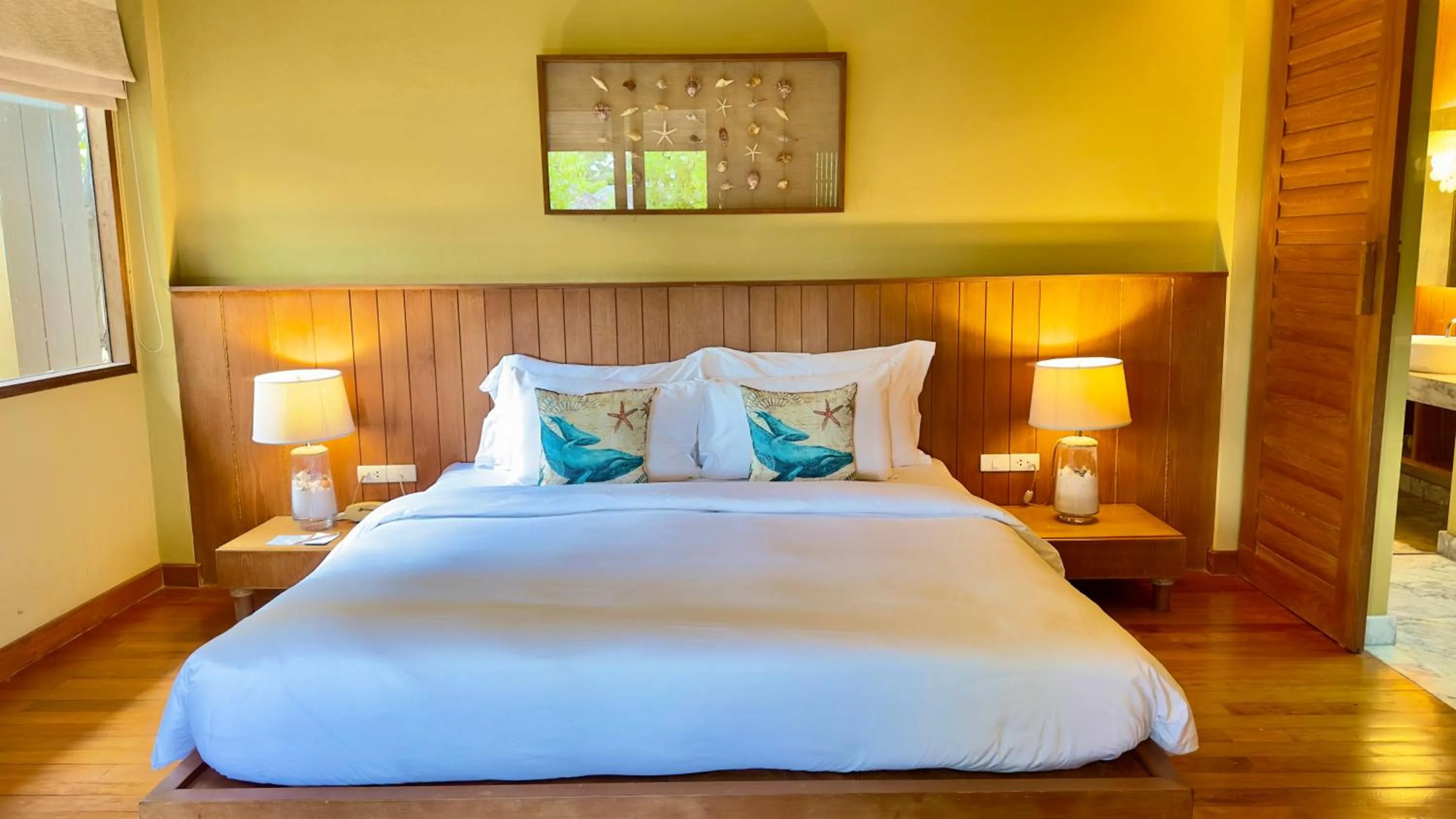 Bed in Deva Beach Resort Samui