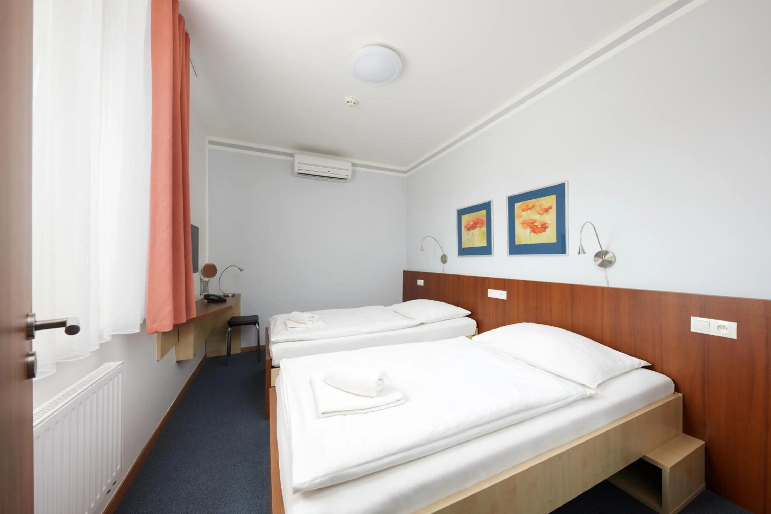 Bed in Hotel Nikolas