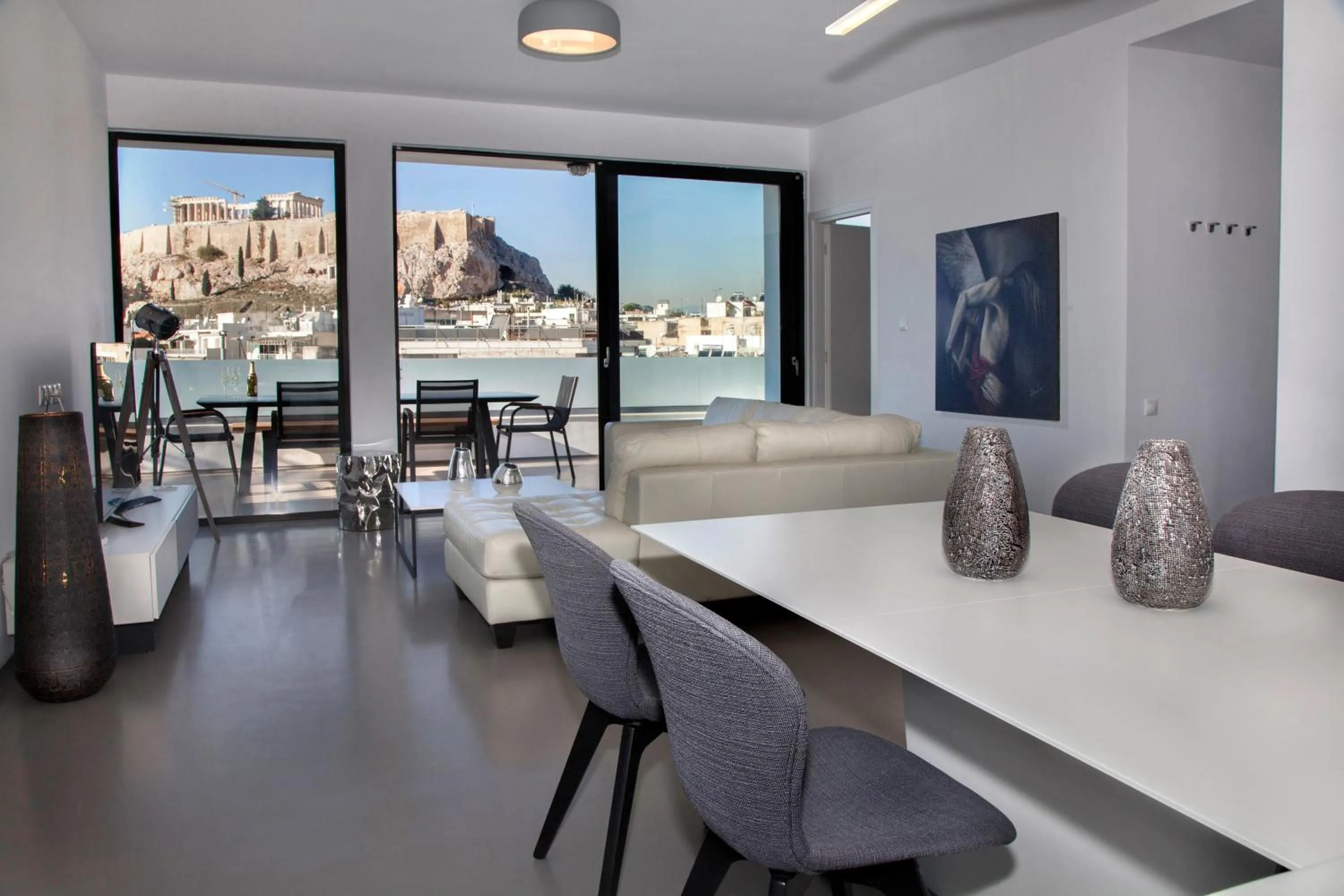 Living room in Luxury Penthouse touching the Acropolis by GHH