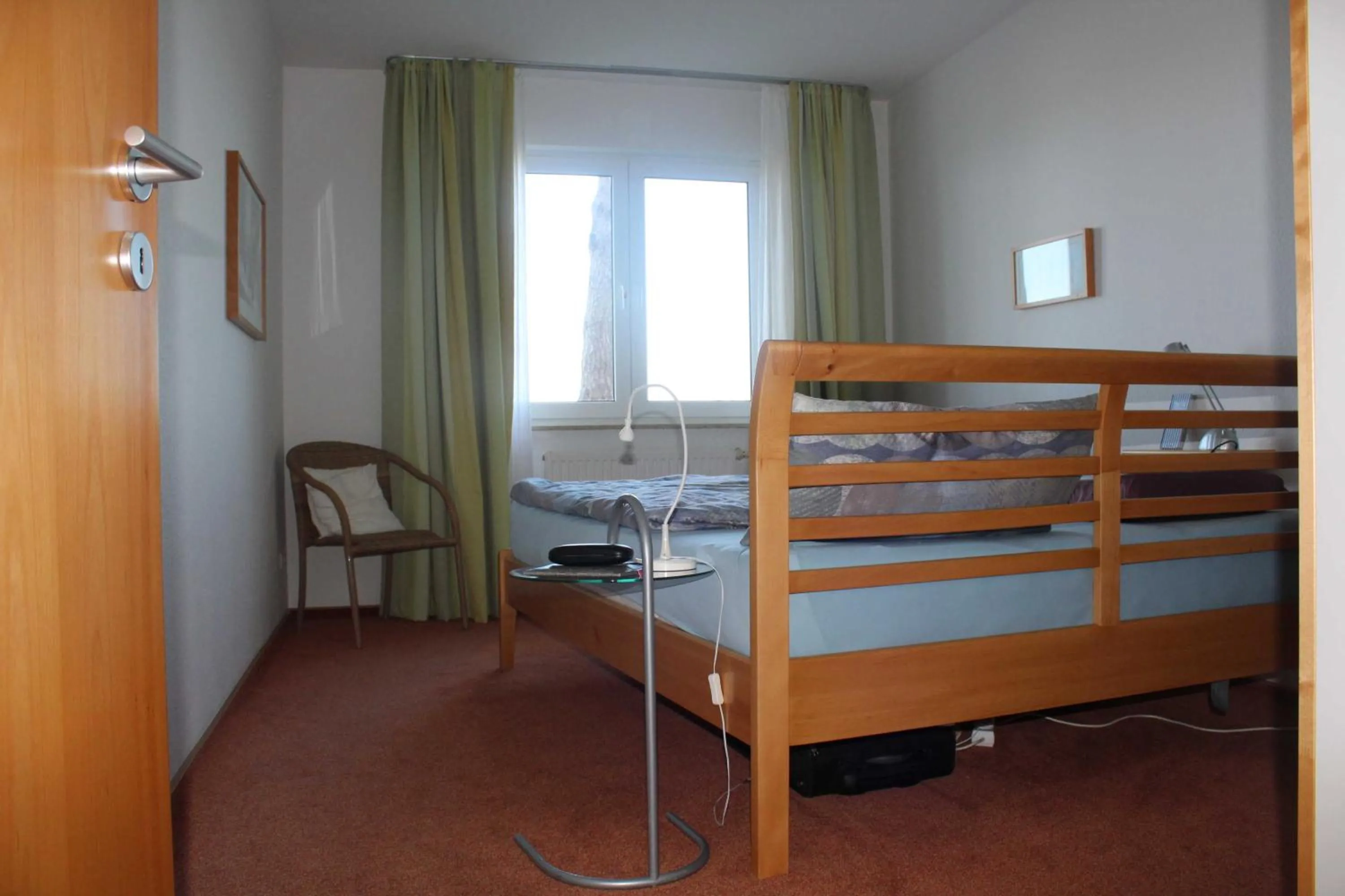 Bed in Ferienwohnung Schwanenwiek
