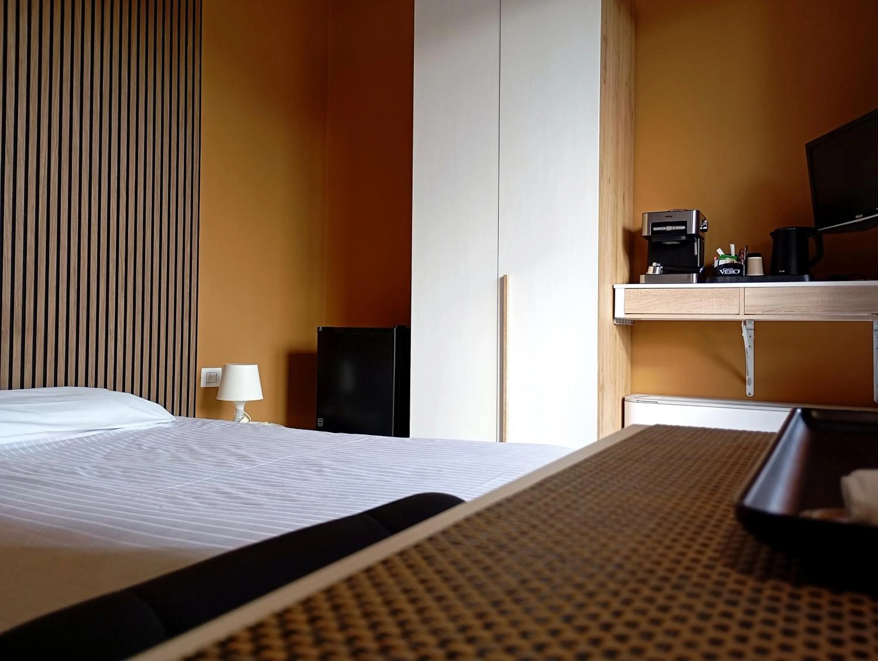 Photo of the whole room, Bed in Il Leone D'Oro