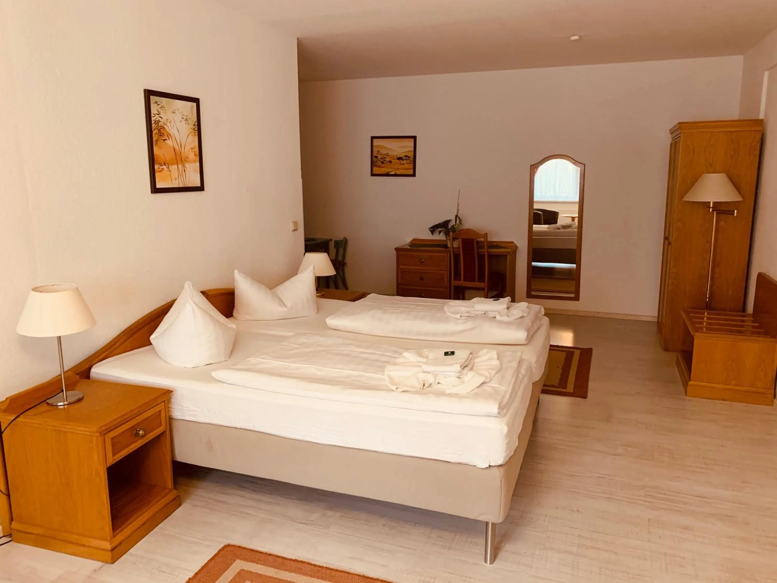 Photo of the whole room, Bed in Hotel Zum Strand
