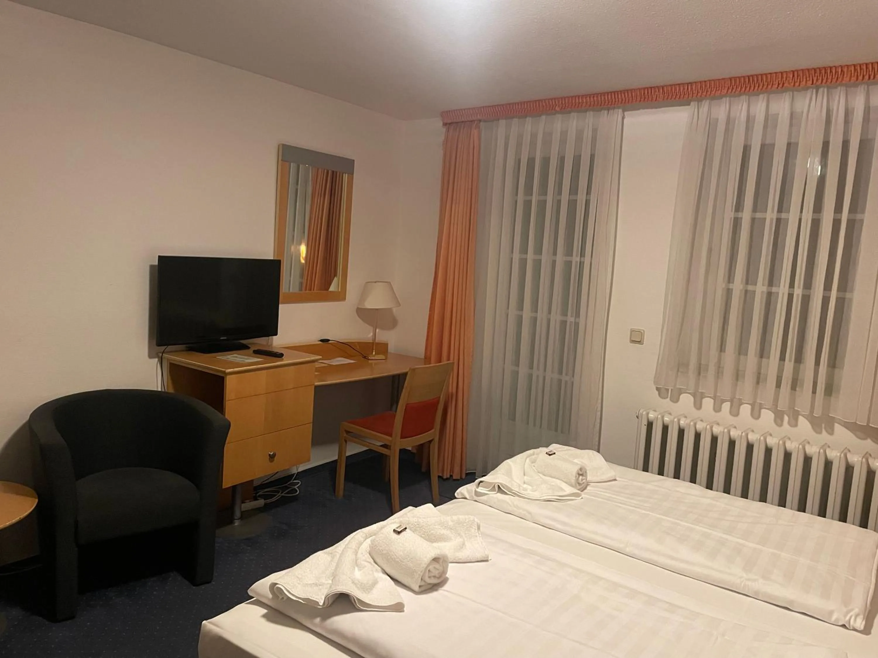 Photo of the whole room, Bed in Hotel Zum Strand