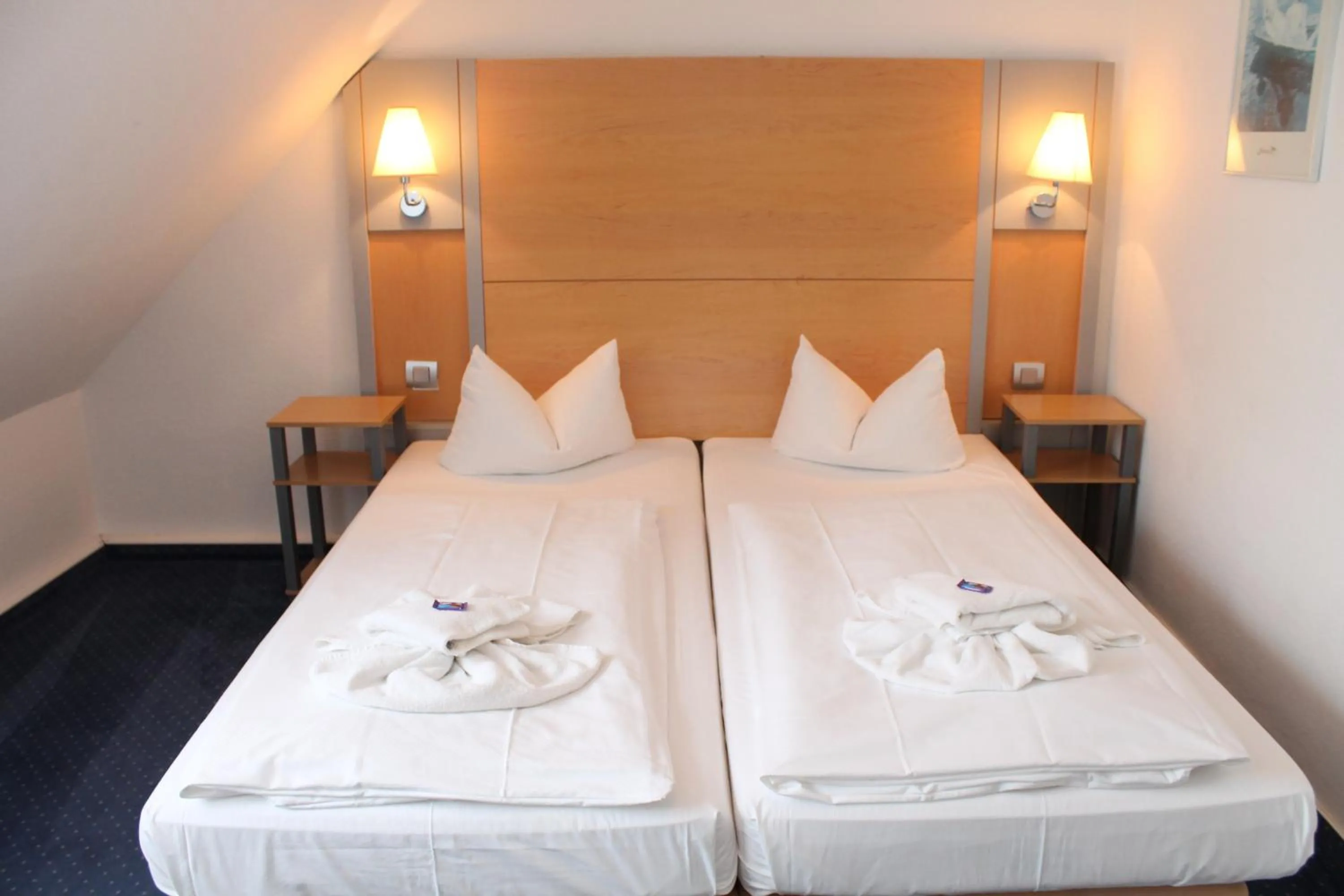 Photo of the whole room, Bed in Hotel Zum Strand