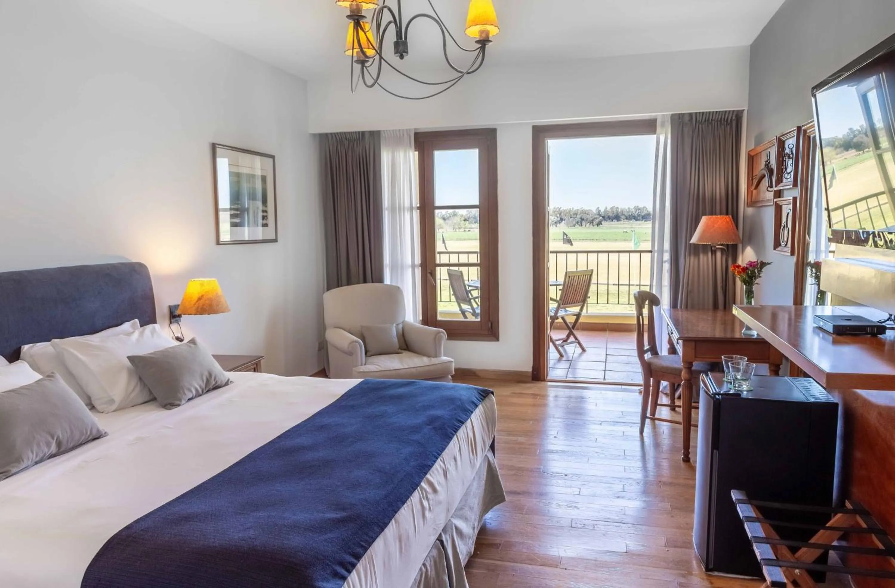 Photo of the whole room, Bed in Wyndham Garden Luján