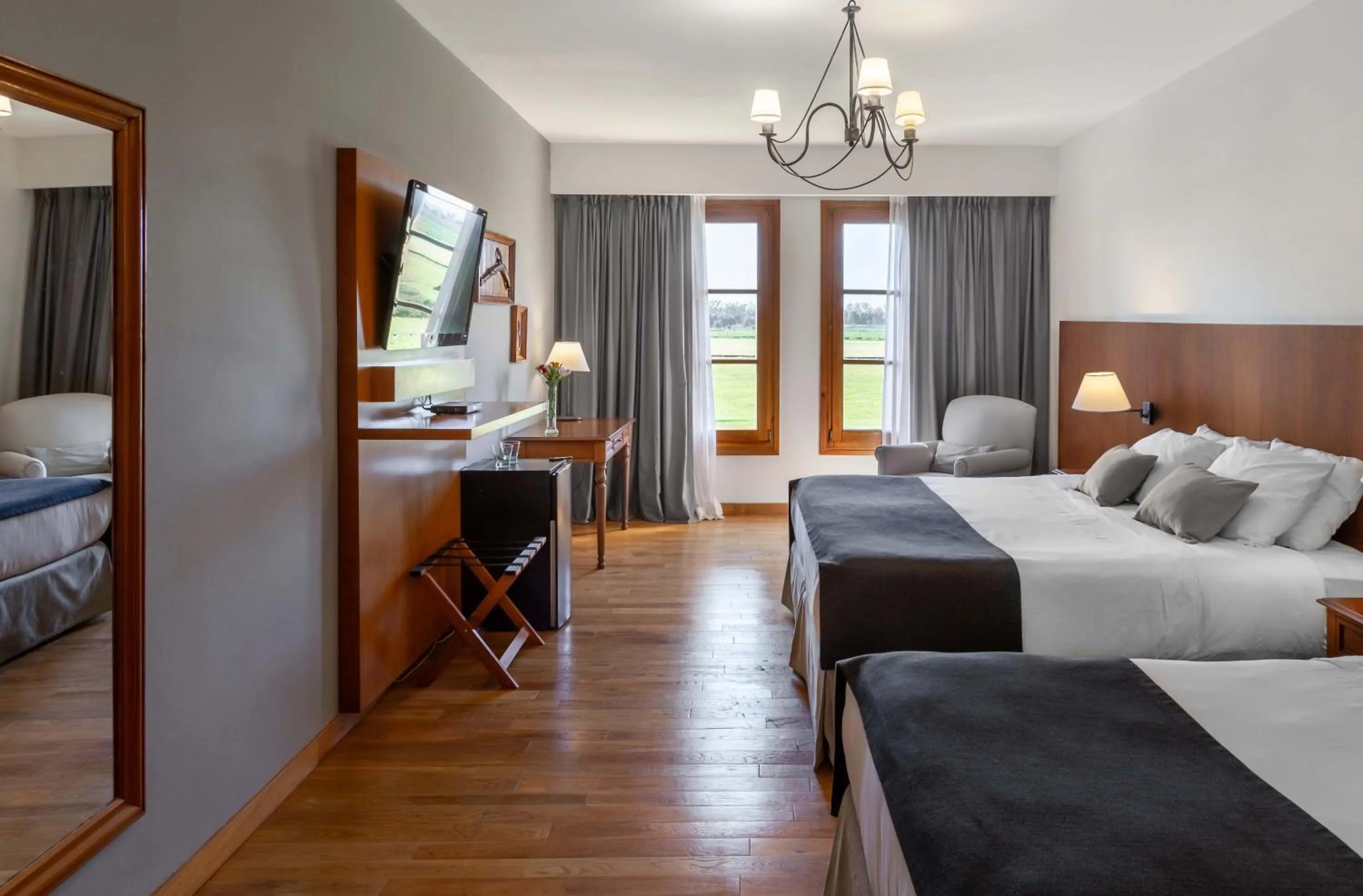 Photo of the whole room, Bed in Wyndham Garden Luján