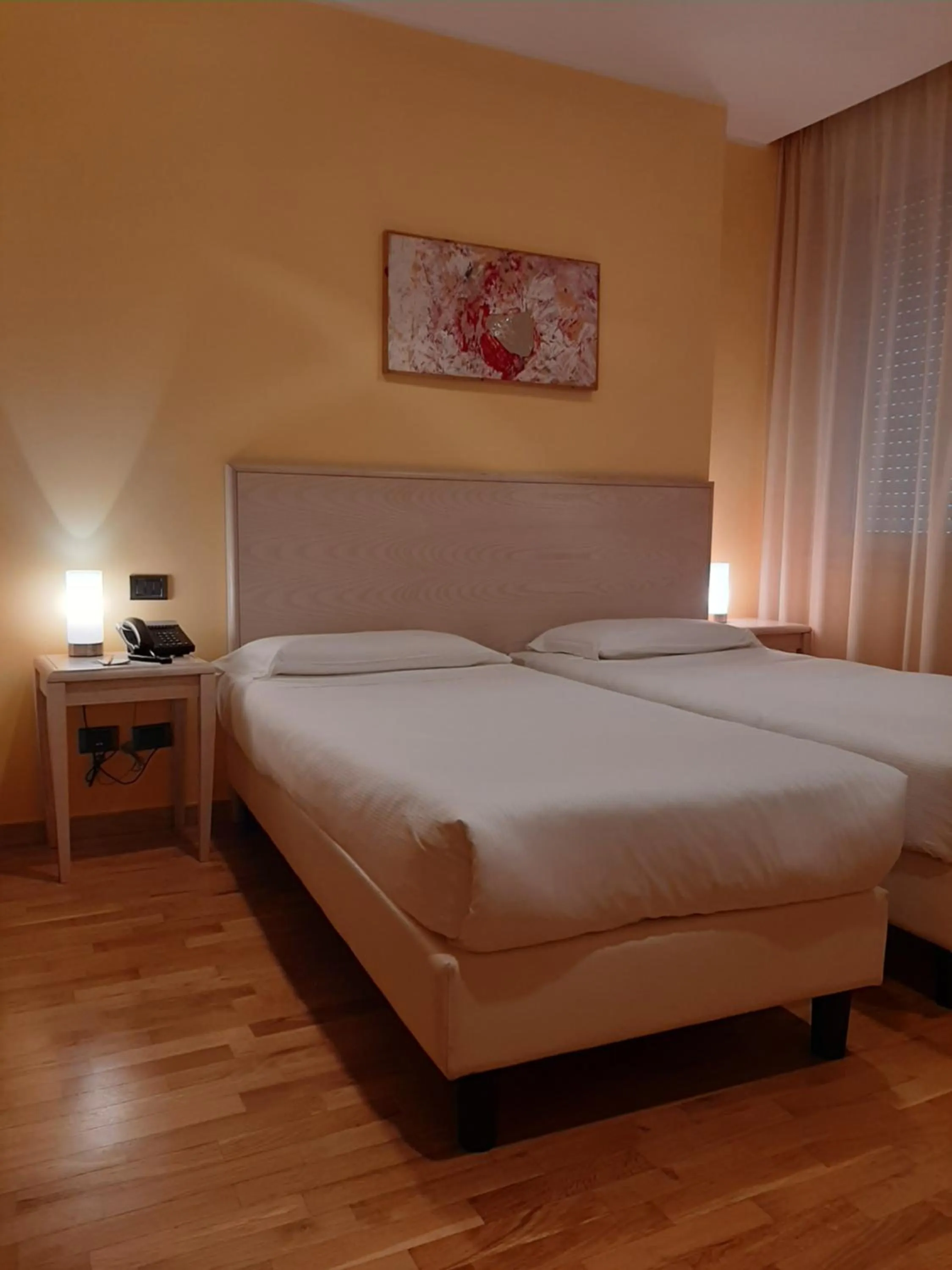 Bed in Hotel Chiaraluna