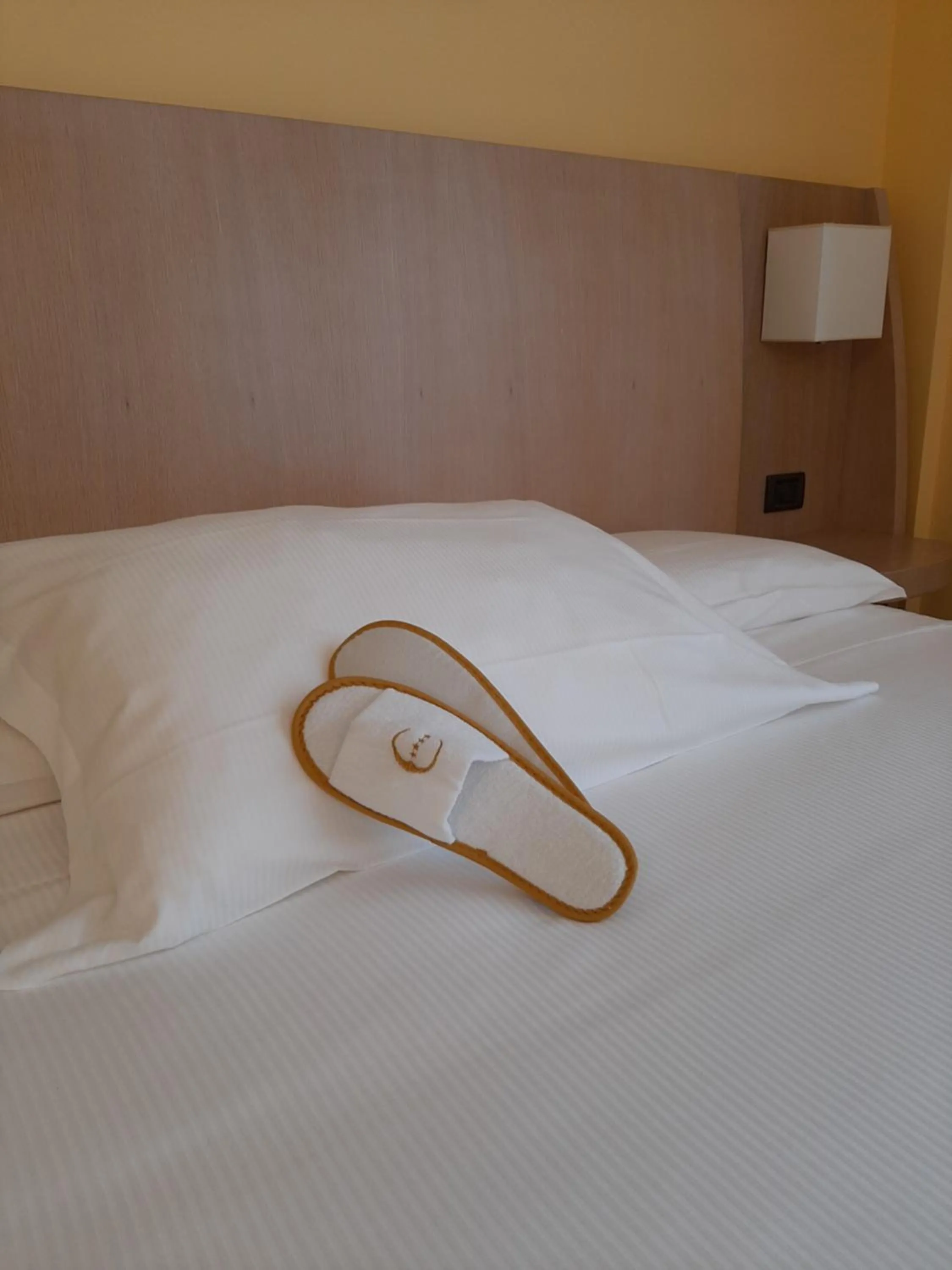 Bed in Hotel Chiaraluna