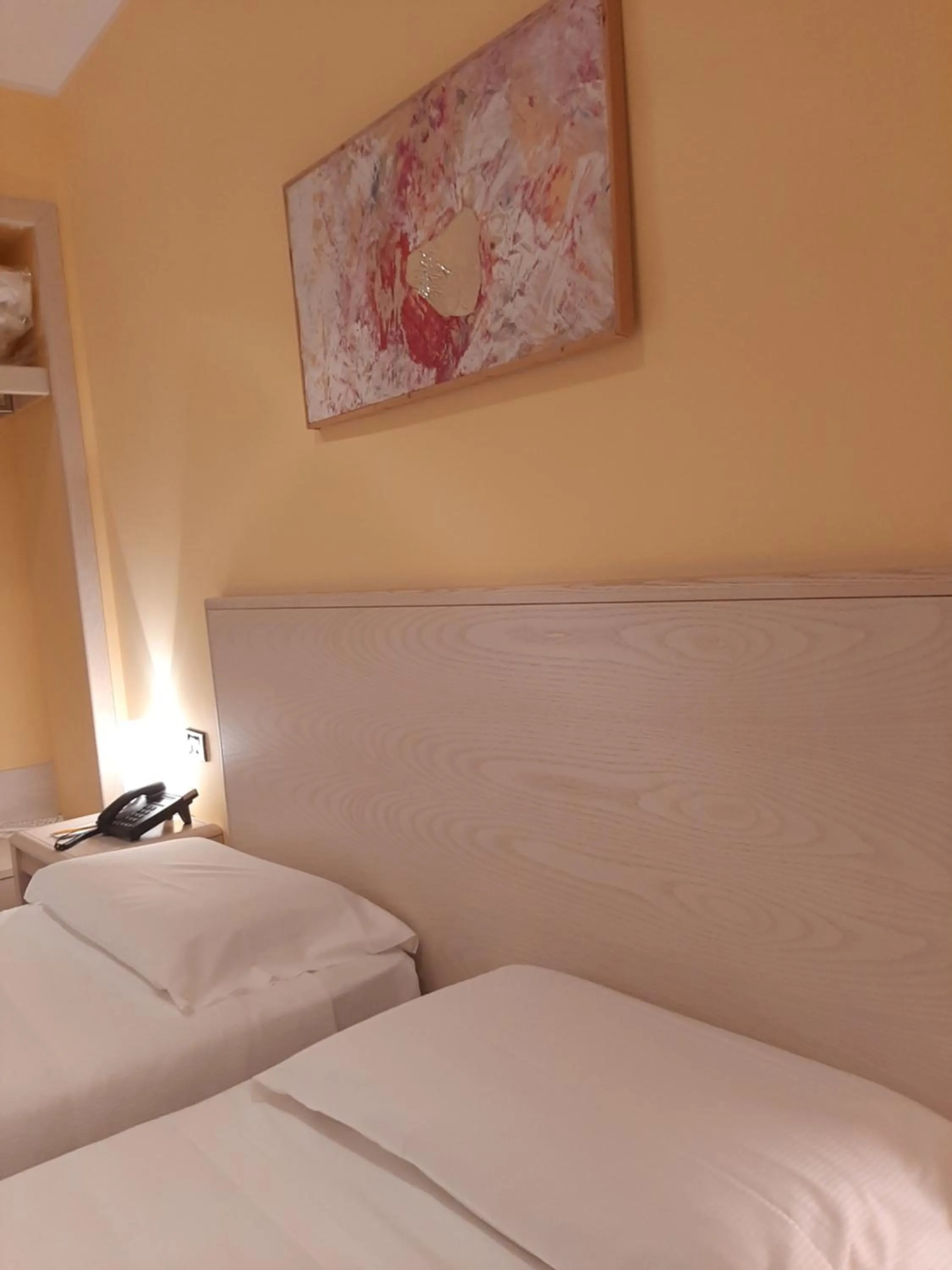 Bed in Hotel Chiaraluna