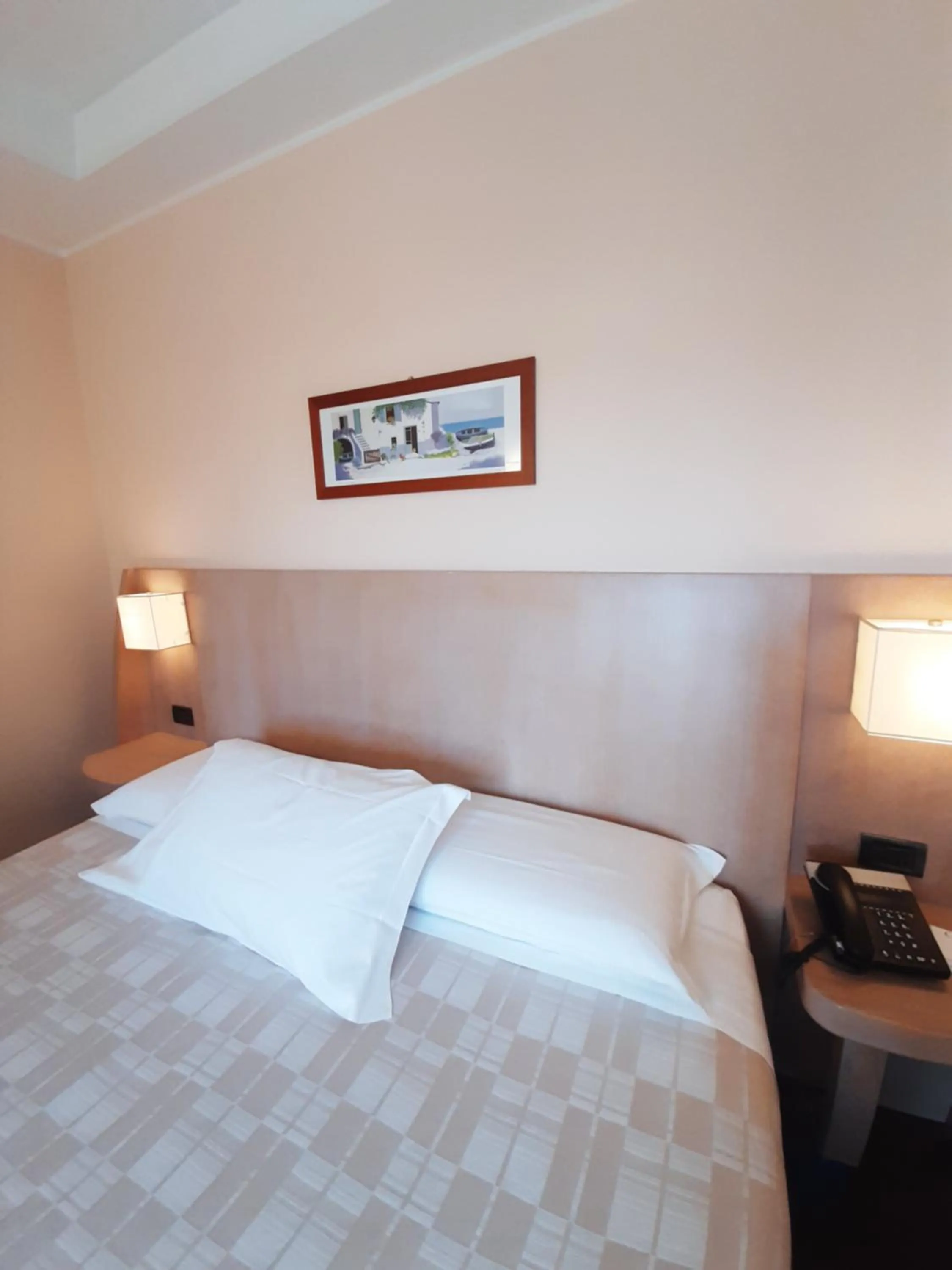 Bed in Hotel Chiaraluna