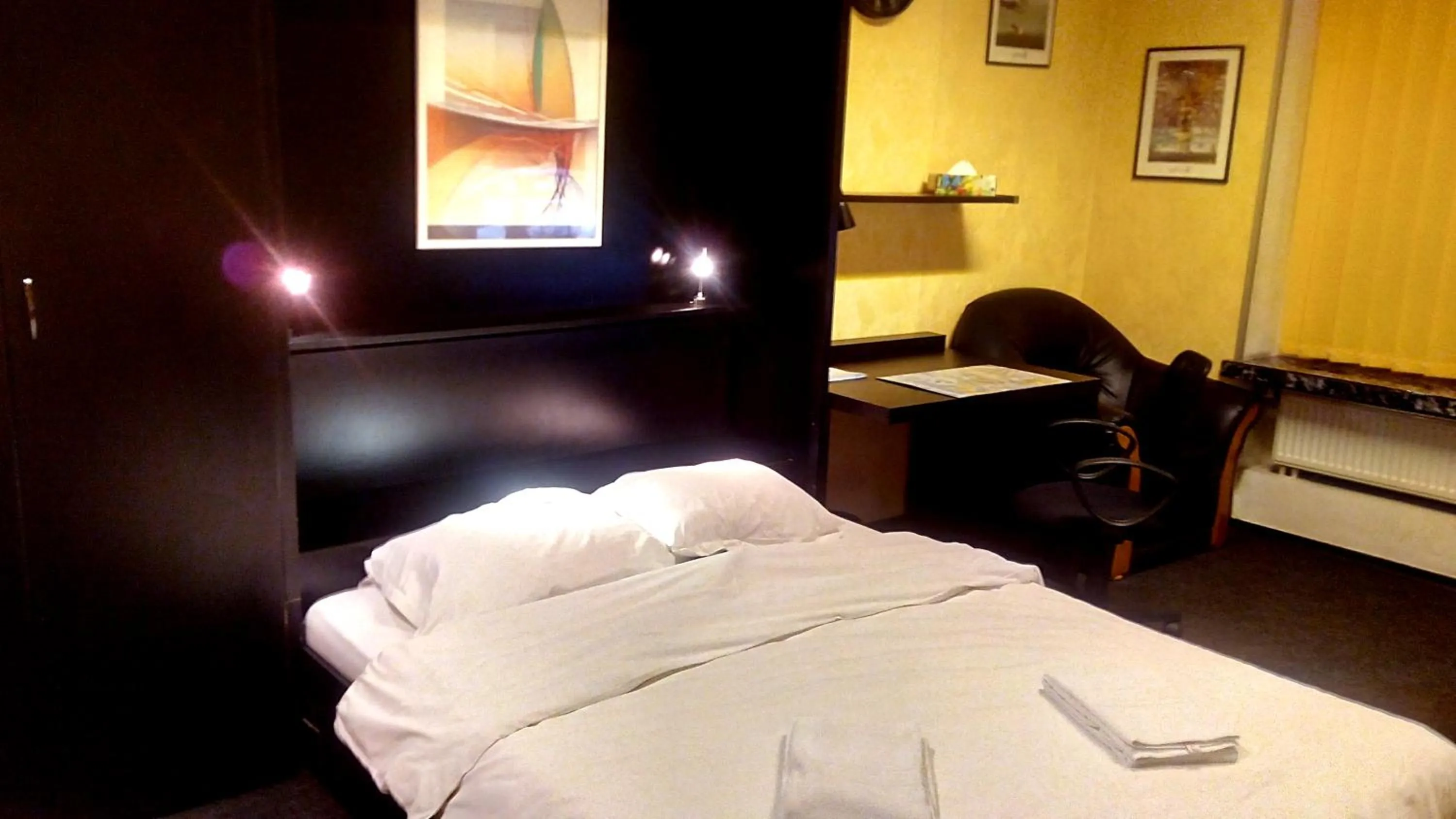 Bed in RomPromo Plus Accommodation